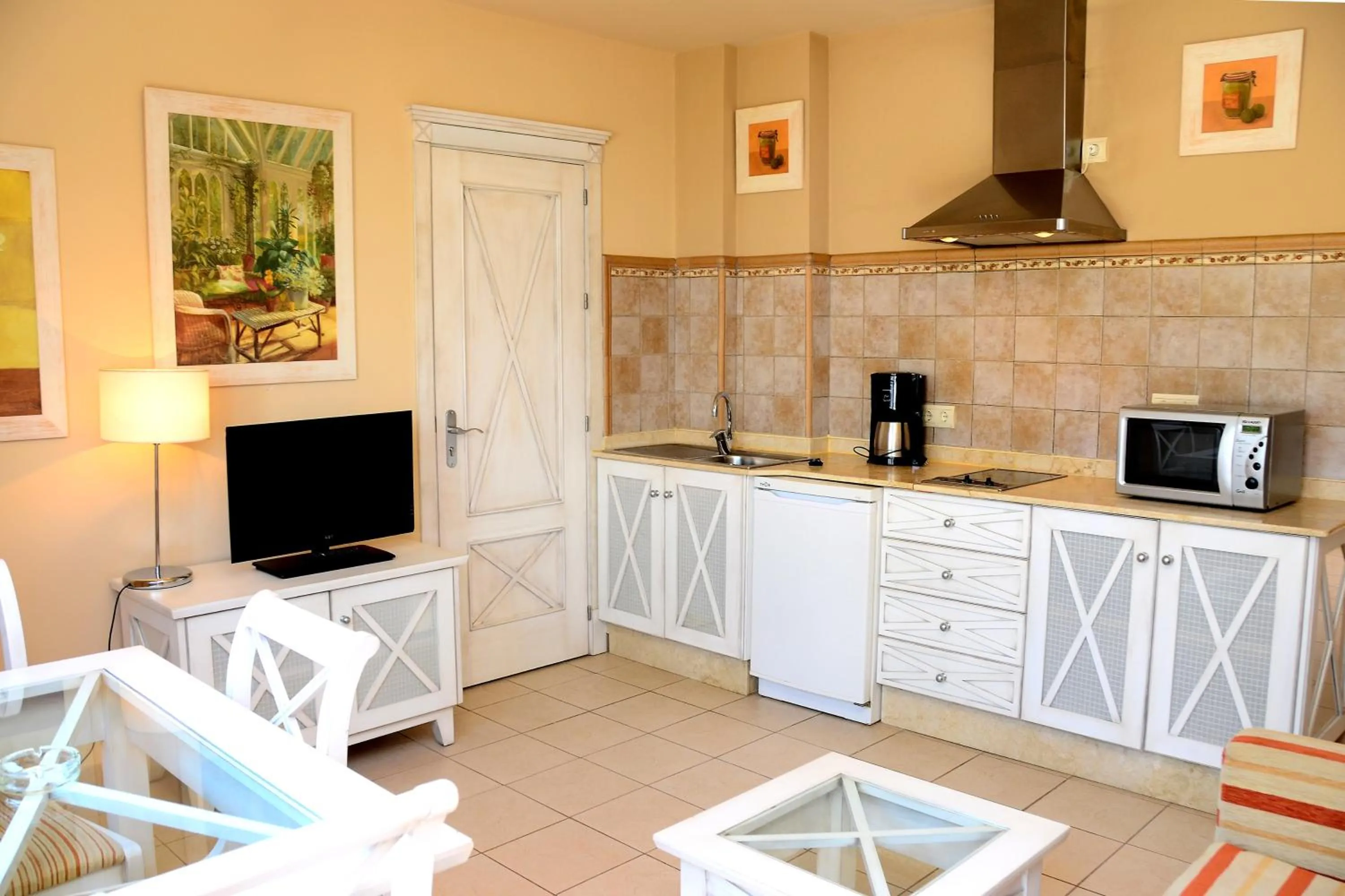 Kitchen or kitchenette in Apartamentos Piedramar