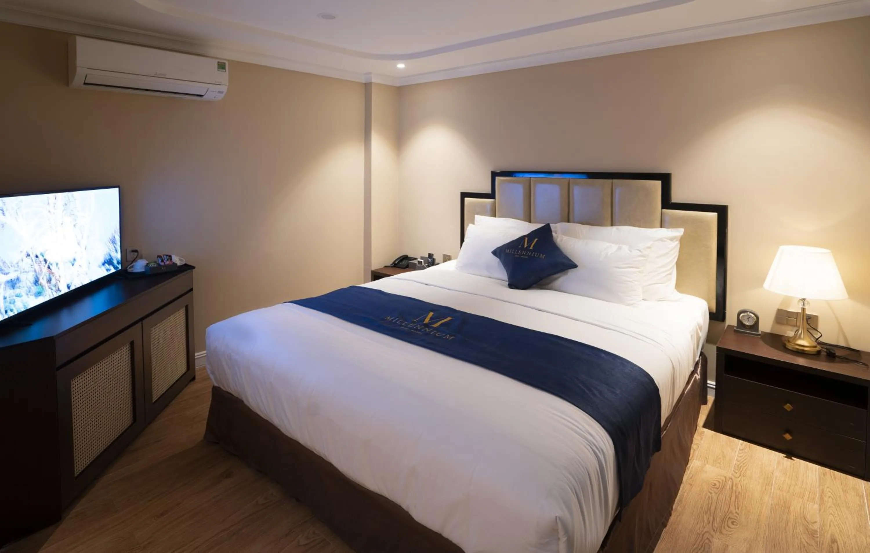 Bed in Millennium Hue Hotel