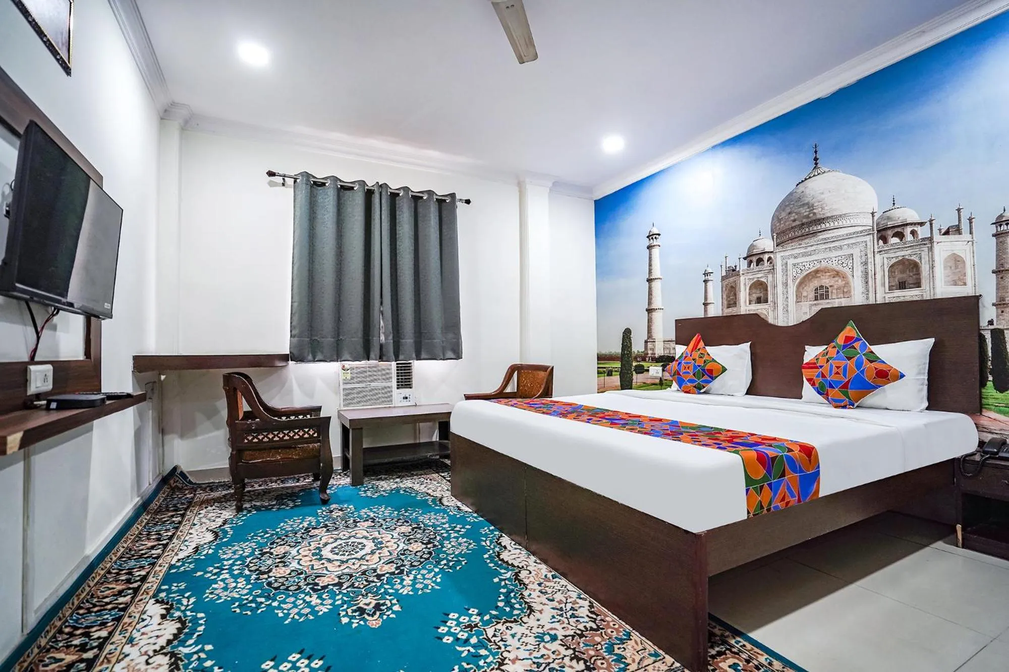 Bed in FabHotel Taj Heritage