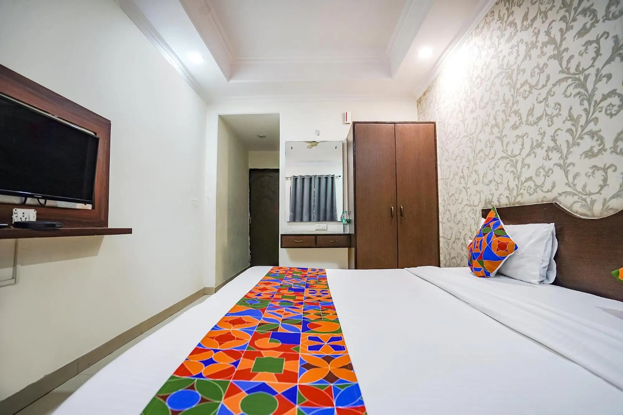 Bed in FabHotel Taj Heritage