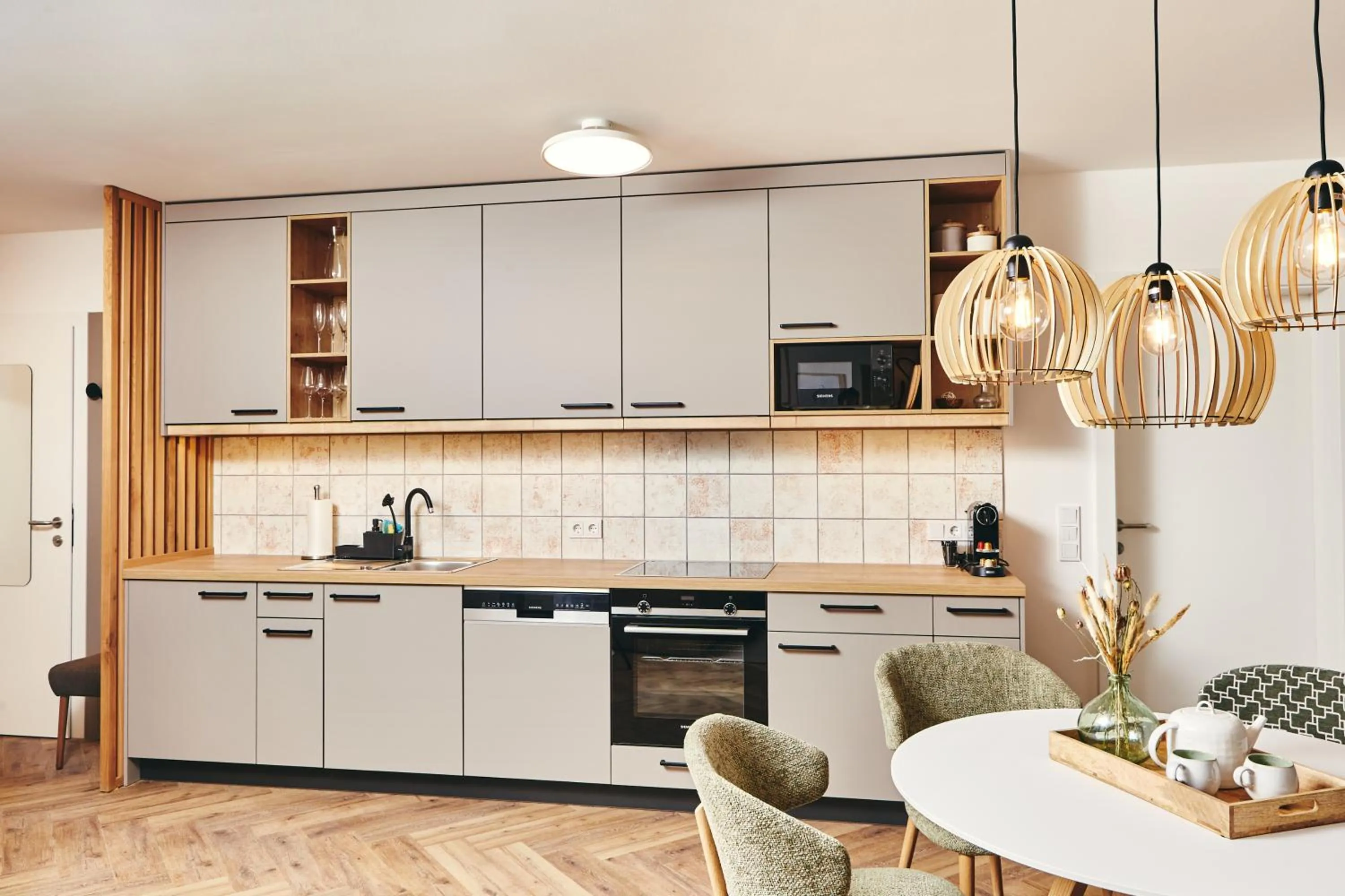 Kitchen or kitchenette in HOMEBOUND APARTMENTS Bad Goisern - contactless check-in