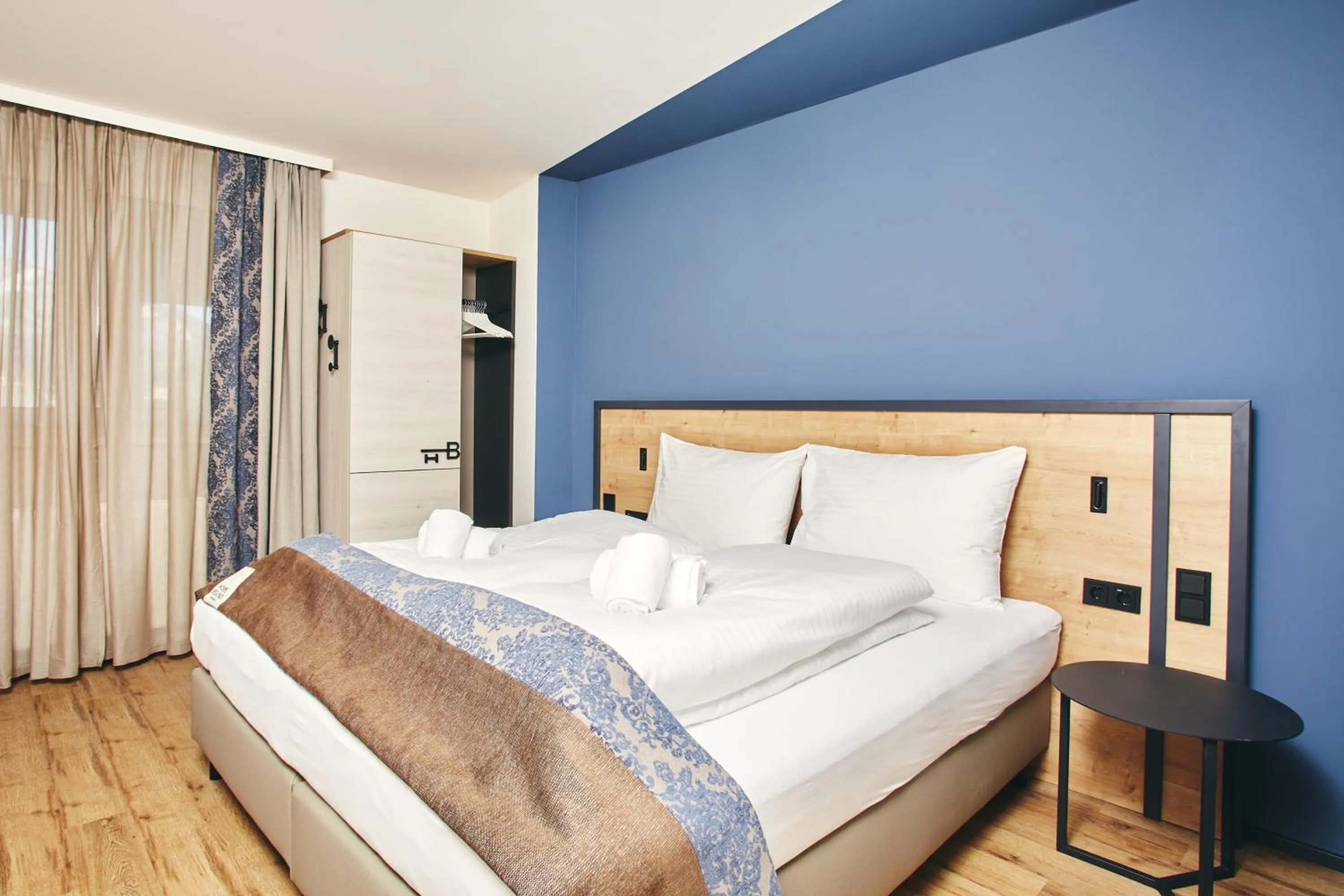 Bedroom, Bed in HOMEBOUND APARTMENTS Bad Goisern - contactless check-in