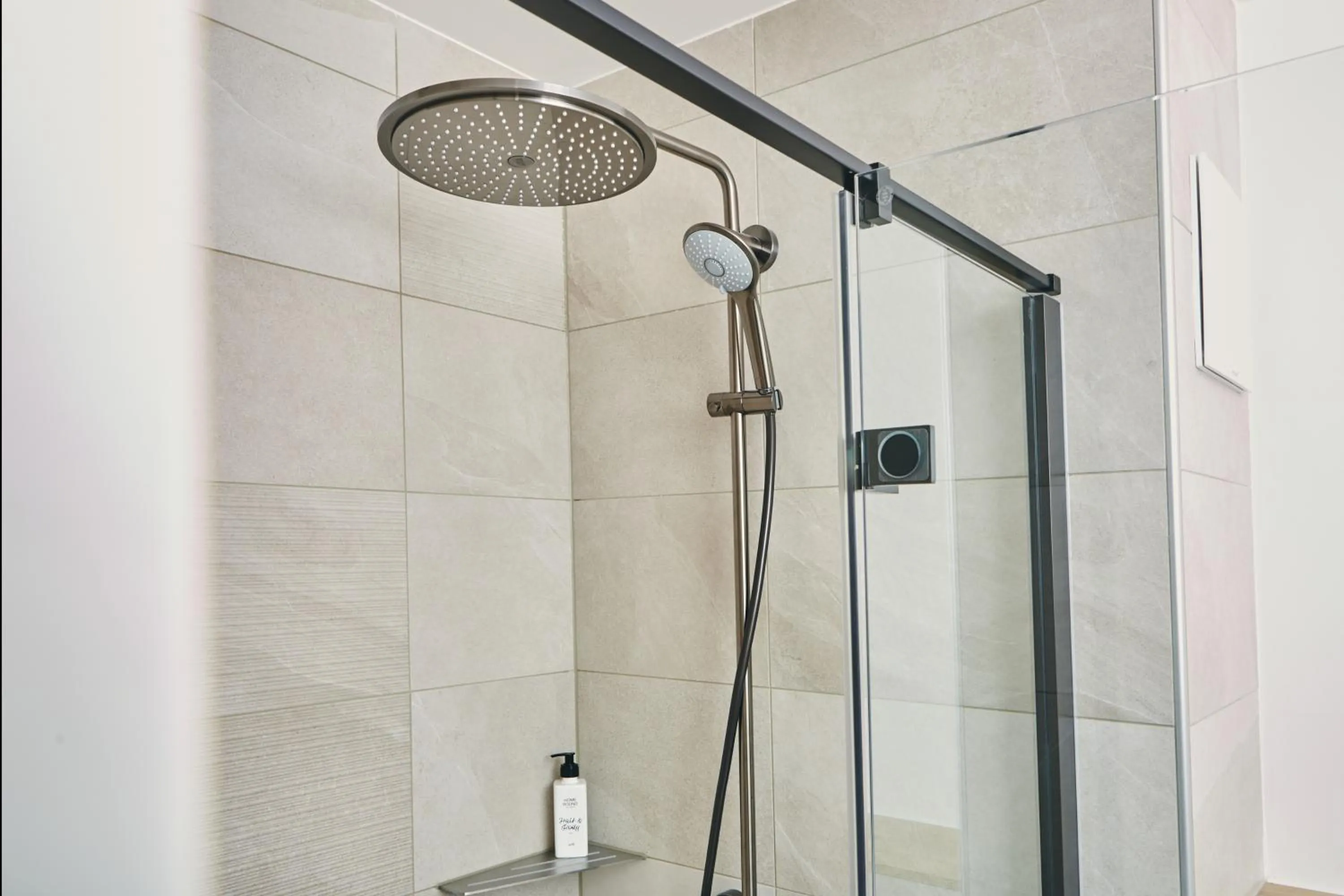 Shower in HOMEBOUND APARTMENTS Bad Goisern - contactless check-in