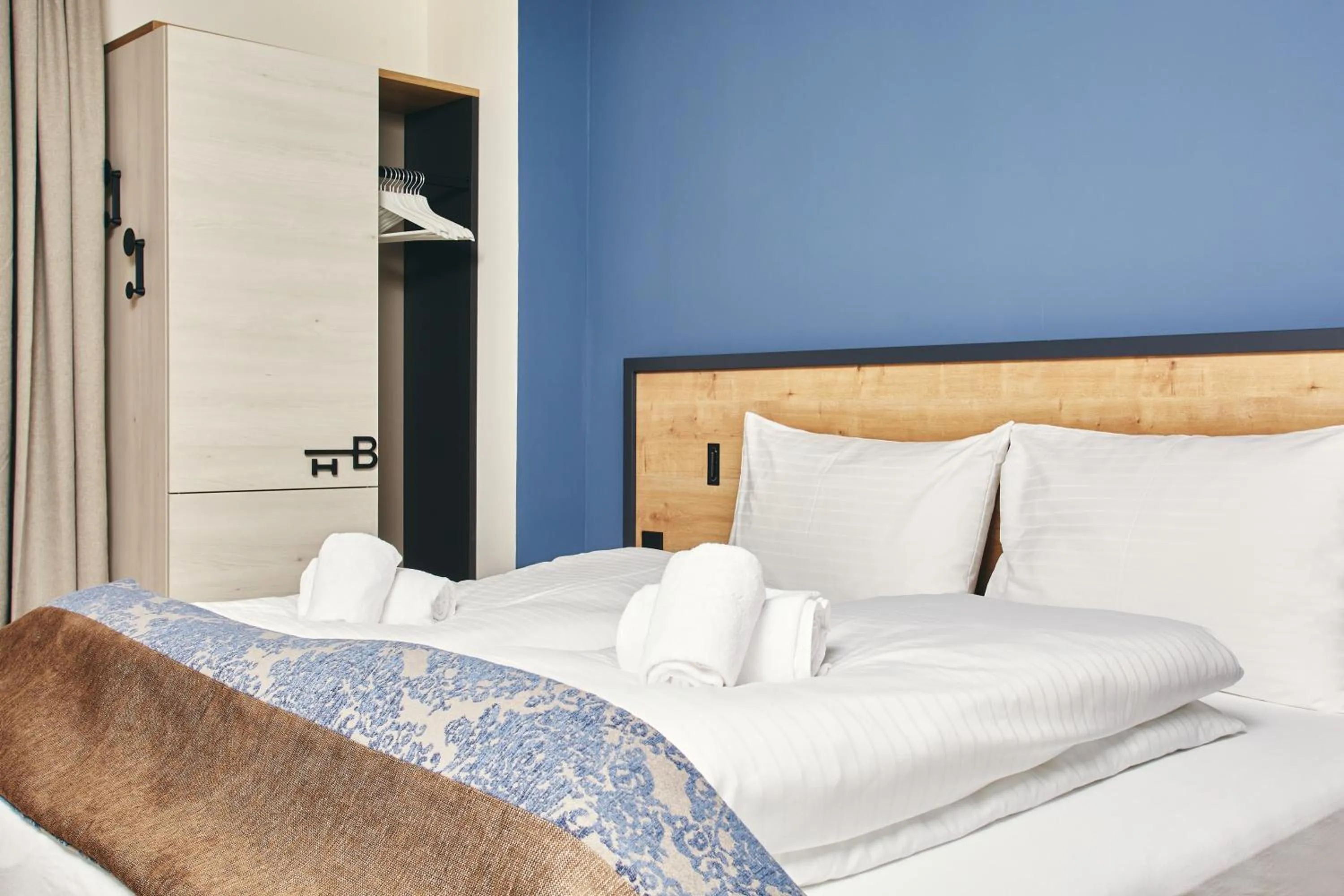 Bed in HOMEBOUND APARTMENTS Bad Goisern - contactless check-in