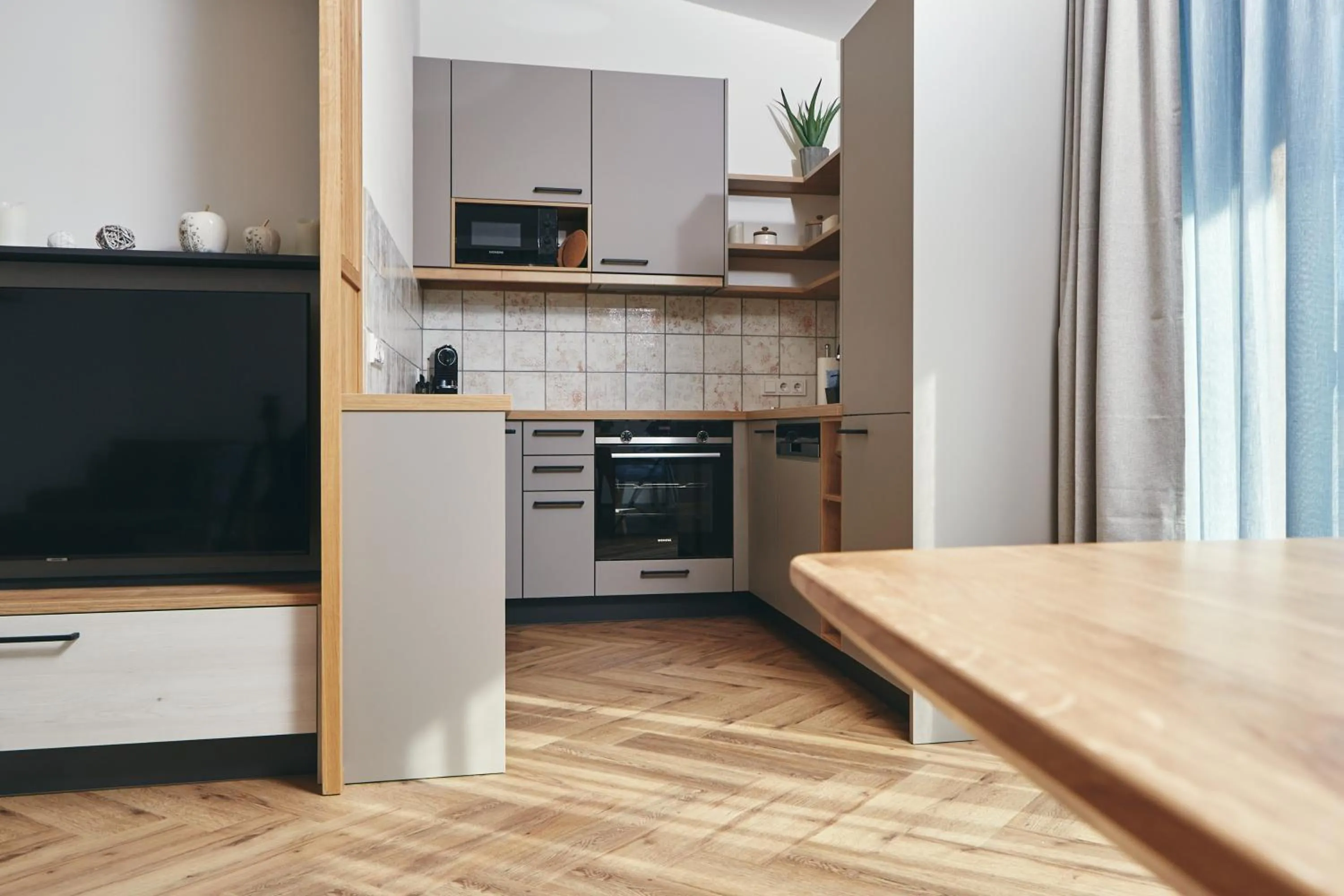 Kitchen or kitchenette in HOMEBOUND APARTMENTS Bad Goisern - contactless check-in