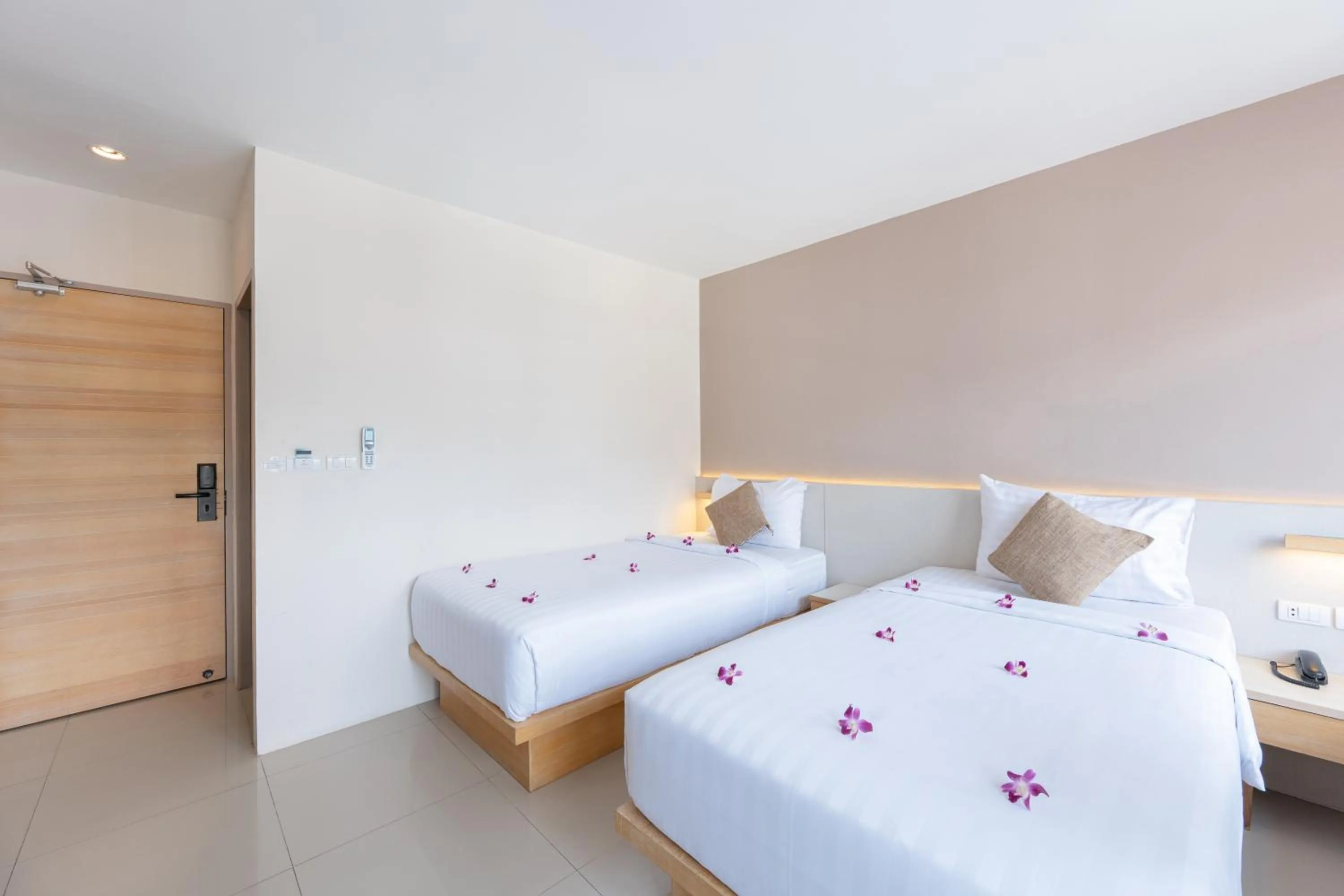 Bed in La Vista Patong Hotel