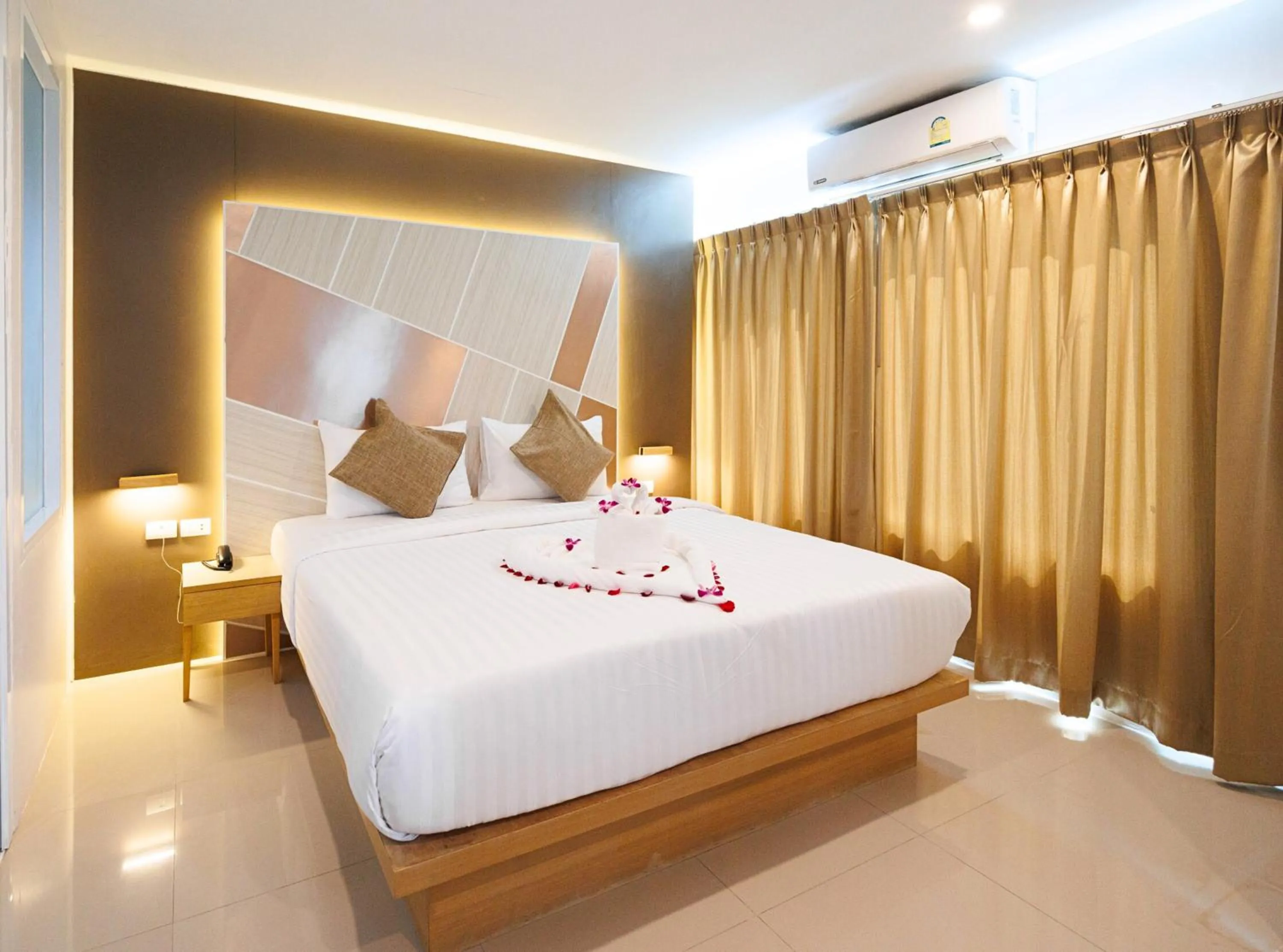 Bed in La Vista Patong Hotel