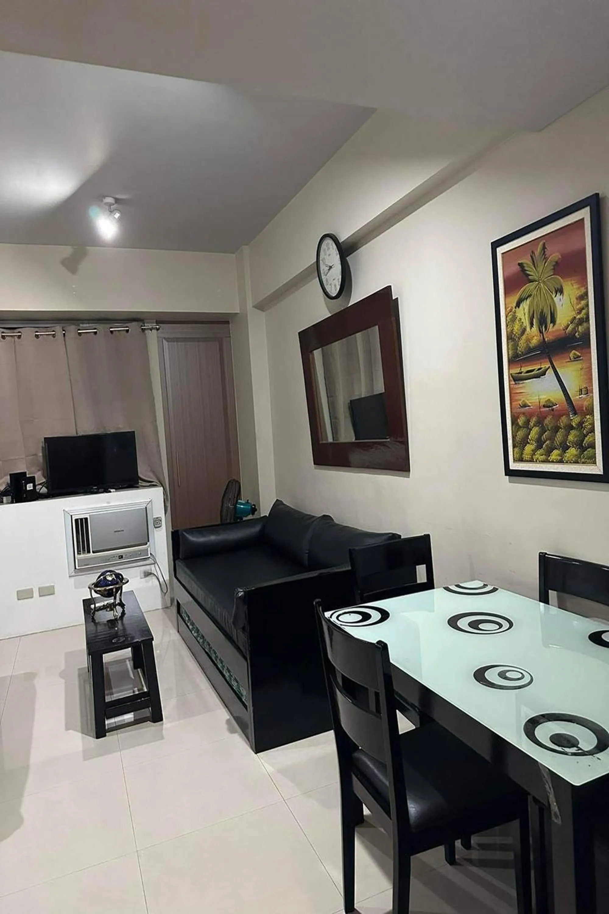 Living room in Del's Condotel across NAIA Terminal 3