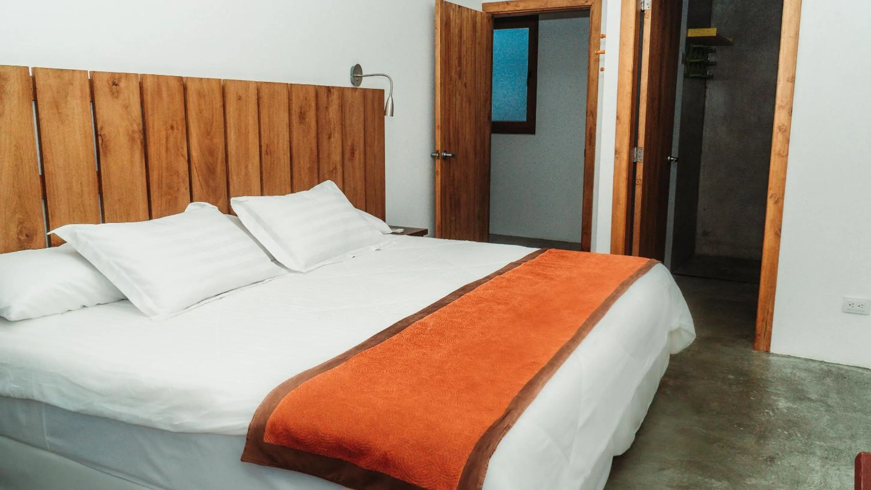 Bed in Mi Playa Galapagos Beachfront Apartments