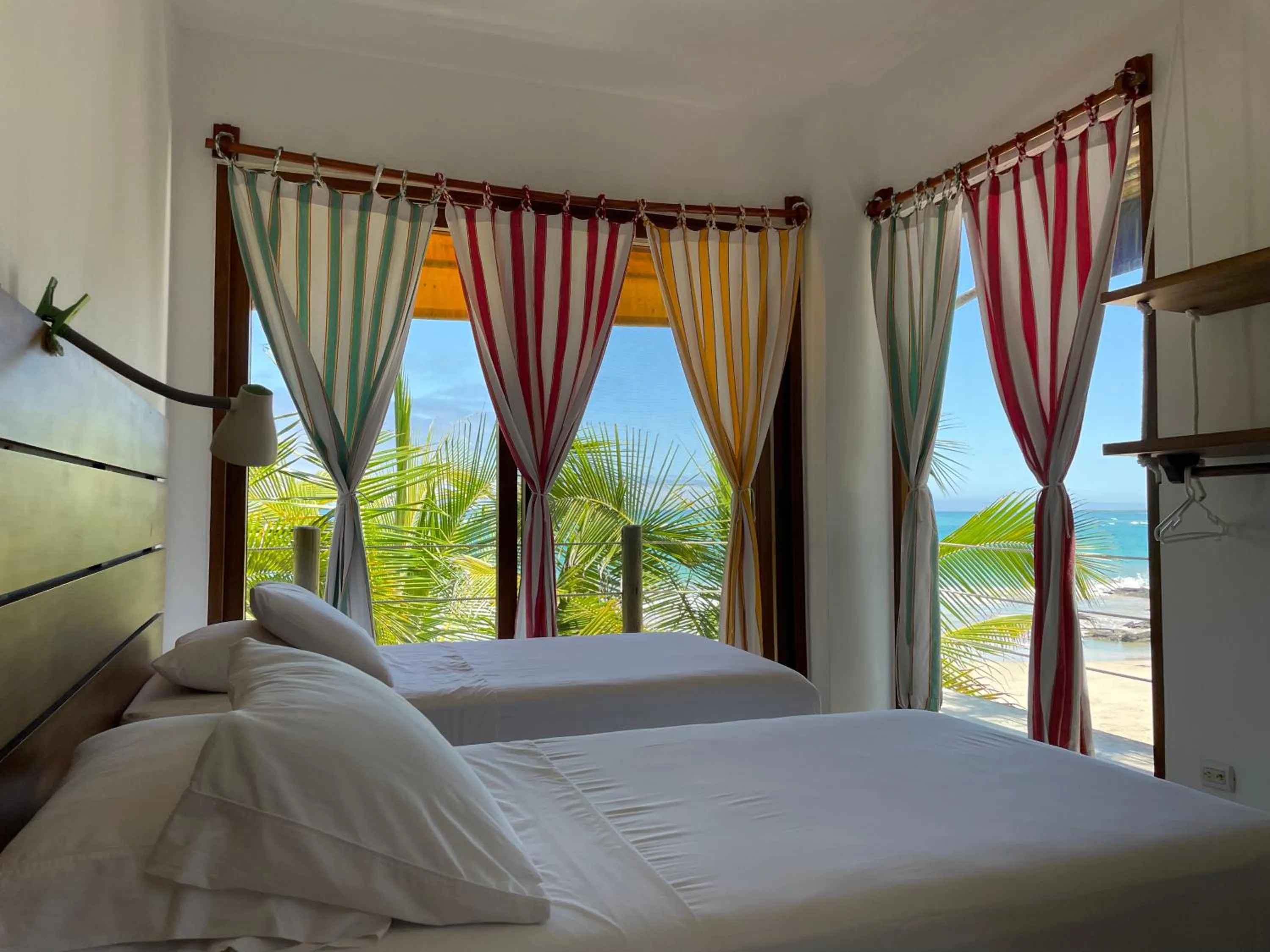 Bed in Mi Playa Galapagos Beachfront Apartments