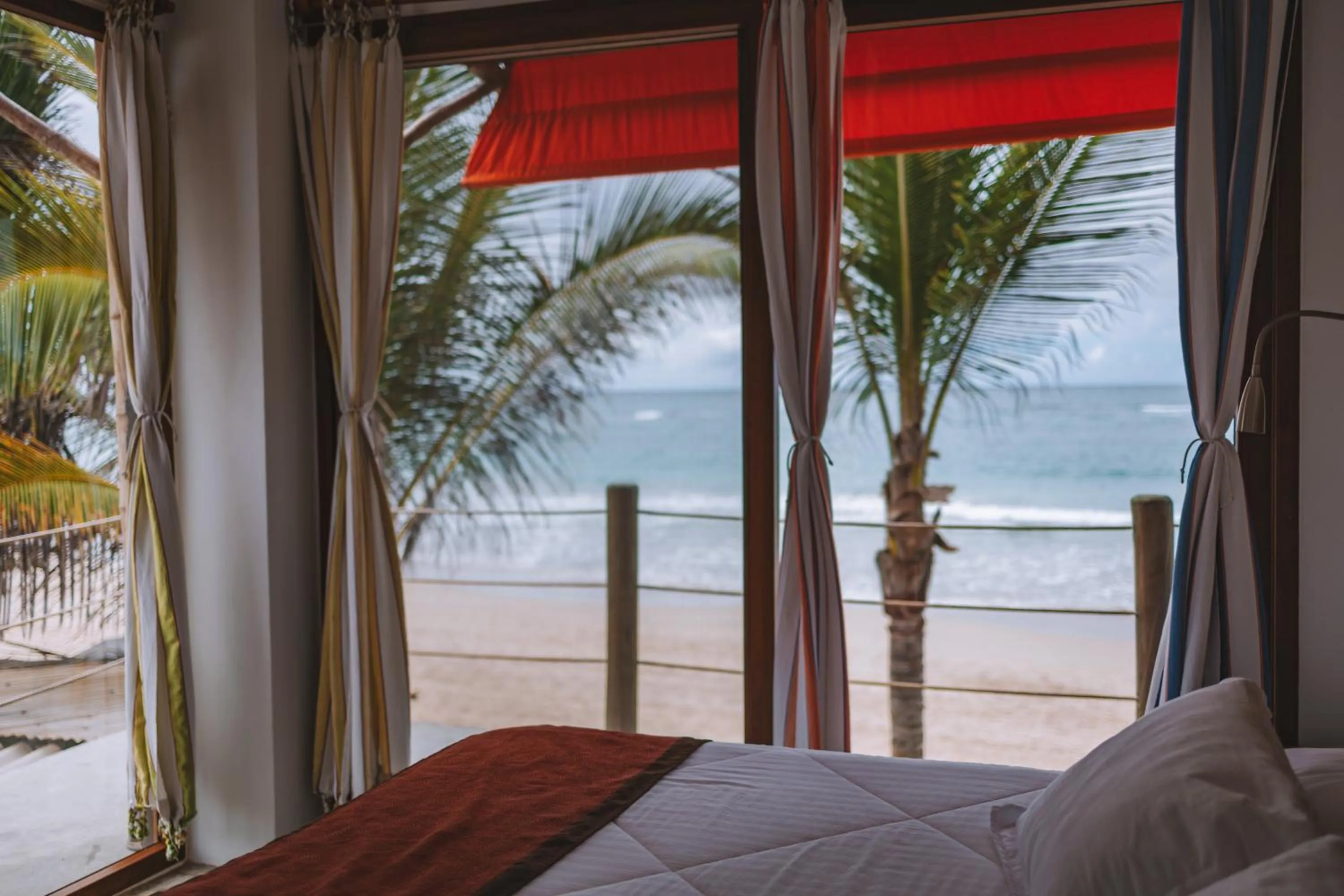 Bed in Mi Playa Galapagos Beachfront Apartments