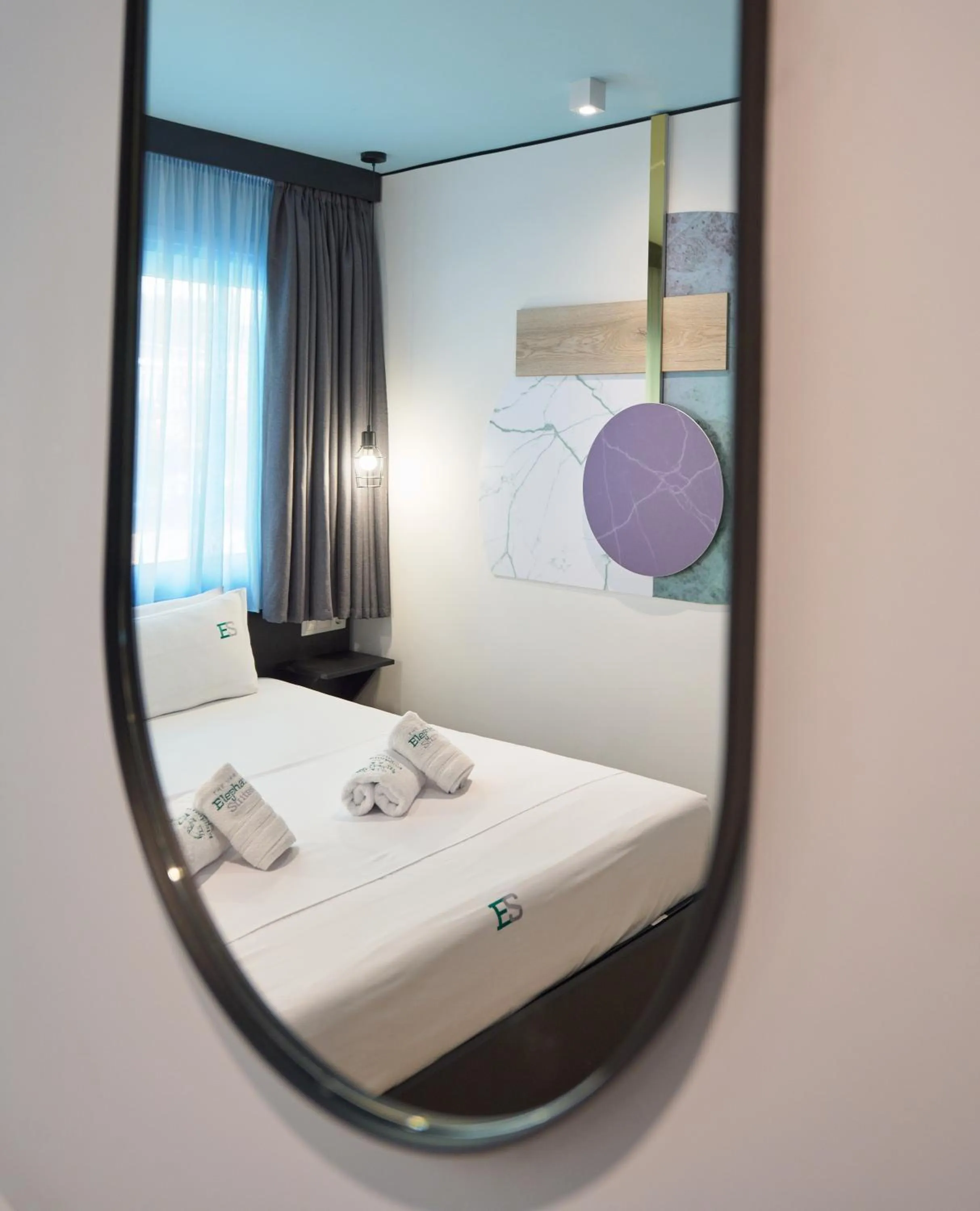 Photo of the whole room, Bed in Urban Elephant Suites