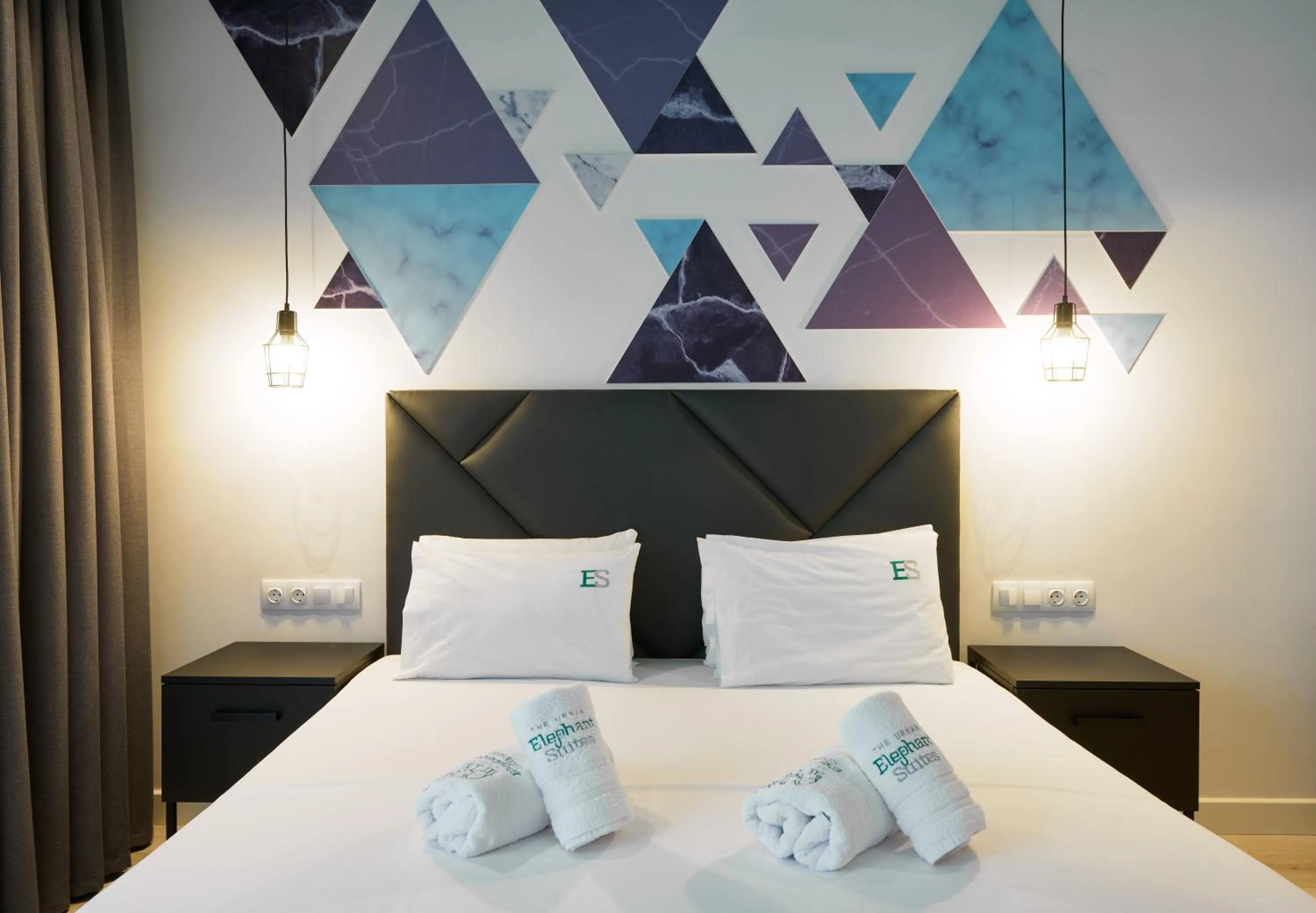 Photo of the whole room, Bed in Urban Elephant Suites