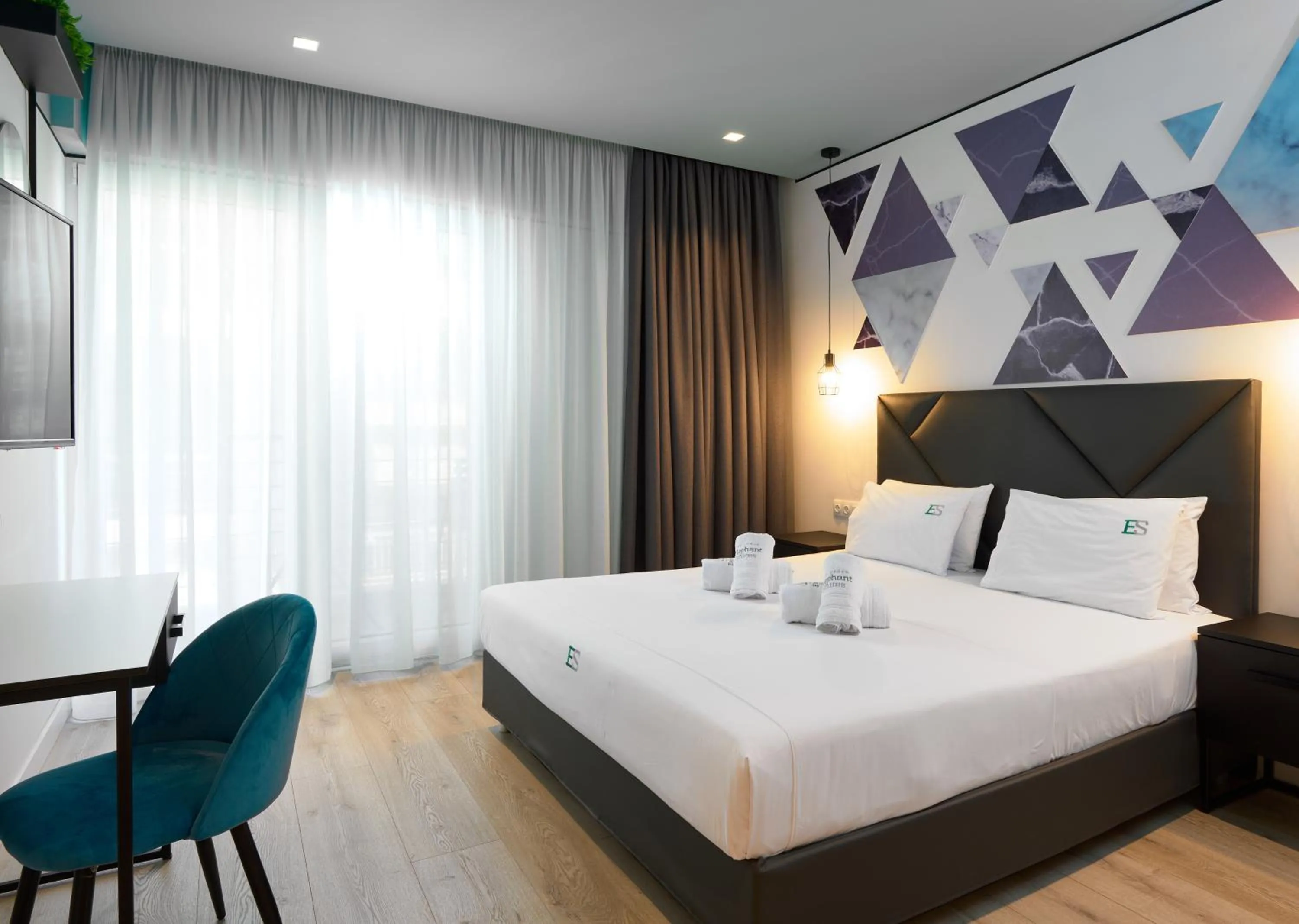 Bed in Urban Elephant Suites