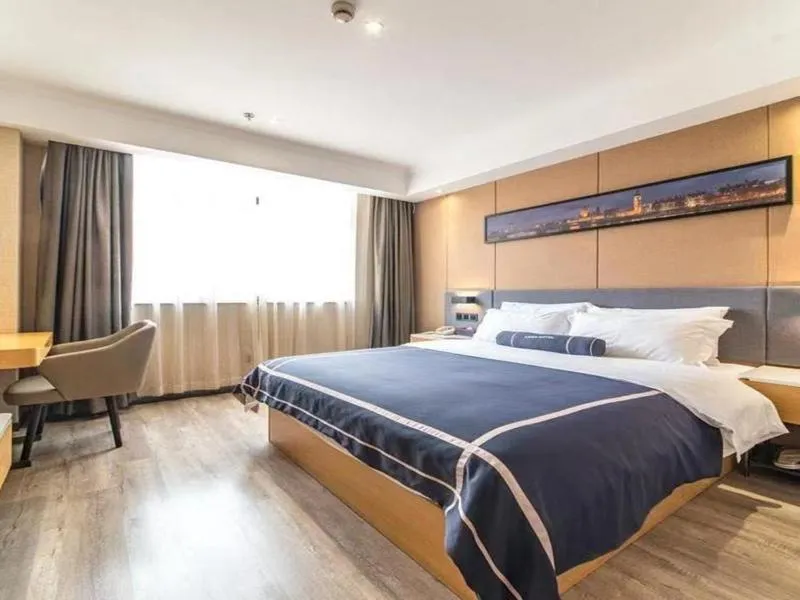 Bed in LanOu Hotel Yancheng Dafeng Yongtai Plaza