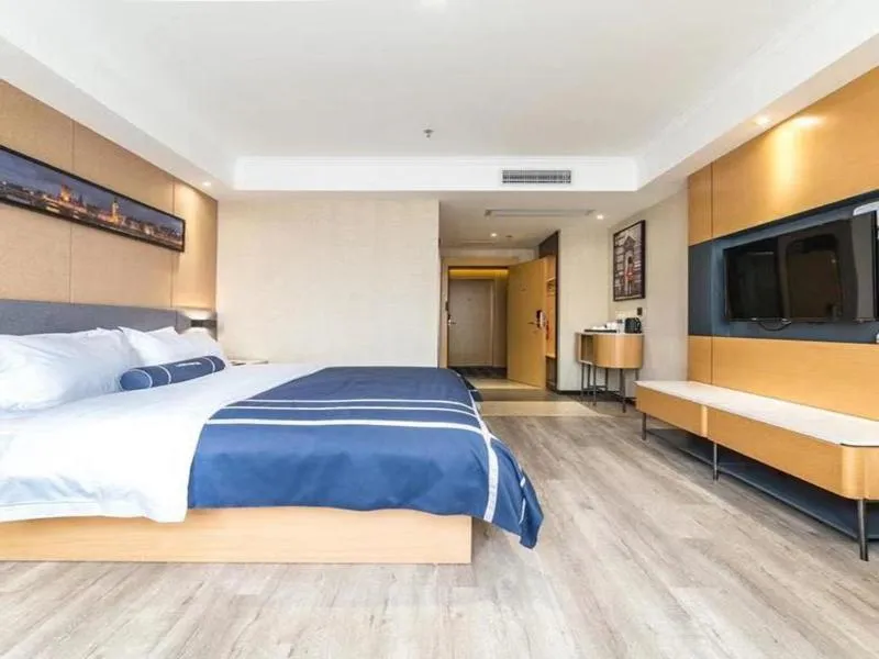 Bed in LanOu Hotel Yancheng Dafeng Yongtai Plaza
