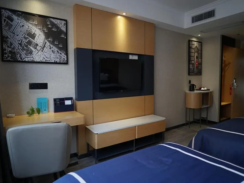 Bed in LanOu Hotel Yancheng Dafeng Yongtai Plaza