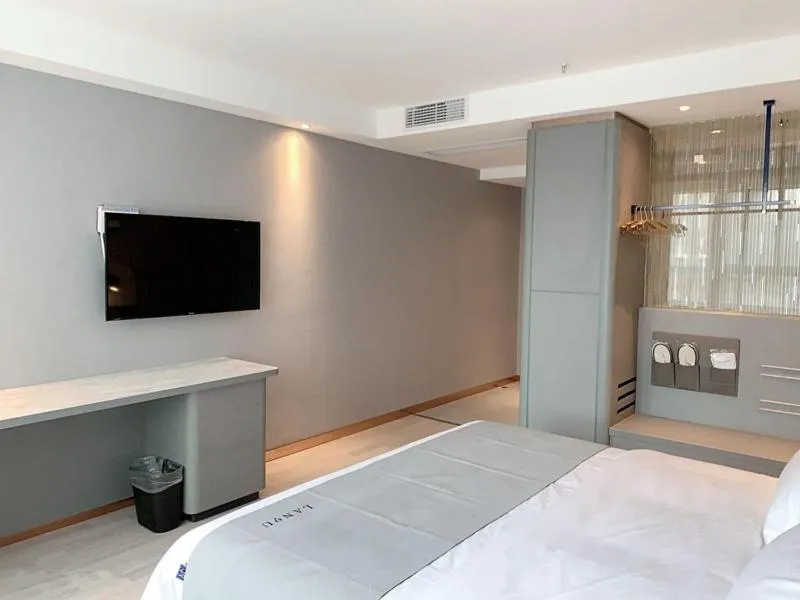 Bed in LanOu Hotel Yancheng Dafeng Yongtai Plaza