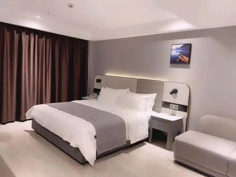 Bed in LanOu Hotel Yancheng Dafeng Yongtai Plaza