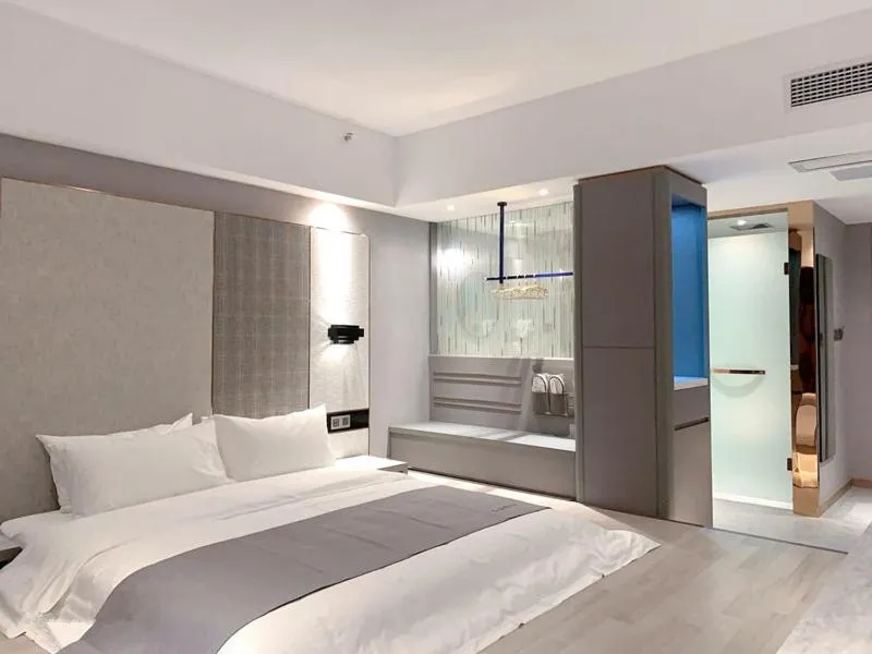 Bed in LanOu Hotel Yancheng Dafeng Yongtai Plaza