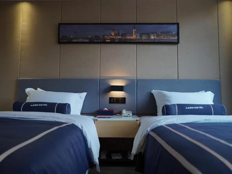 Bed in LanOu Hotel Yancheng Dafeng Yongtai Plaza