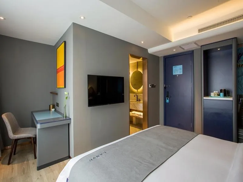 Bed in LanOu Hotel Zhenjiang Runzhou District Railway Station