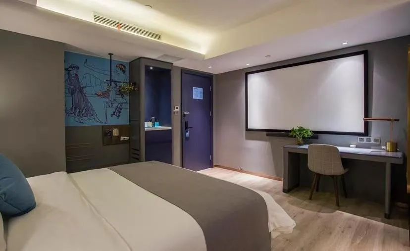 Bed in LanOu Hotel Zhenjiang Runzhou District Railway Station