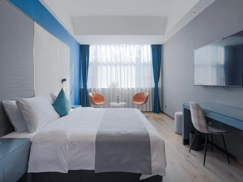 Bed in LanOu Hotel Taixing Wanda Plaza