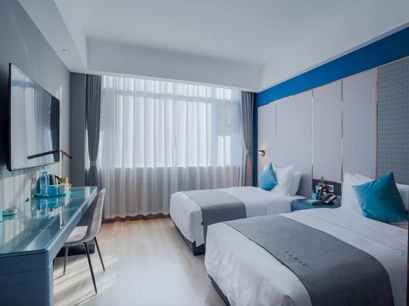 Bed in LanOu Hotel Taixing Wanda Plaza
