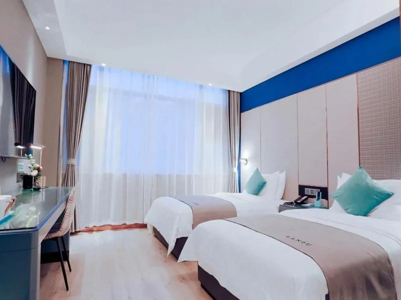 Bed in LanOu Hotel Taixing Wanda Plaza