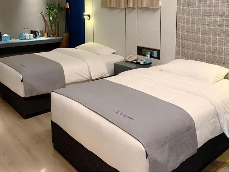Bed in LanOu Hotel Linyi Lanling Agricultural Park