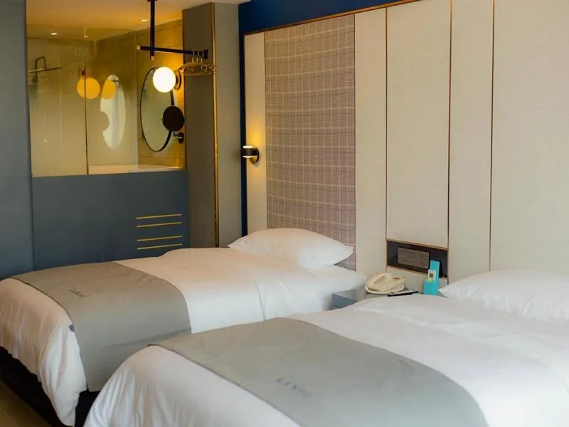 Bed in LanOu Hotel Linyi Lanling Agricultural Park