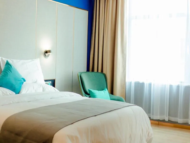 Bed in LanOu Hotel Linyi Lanling Agricultural Park