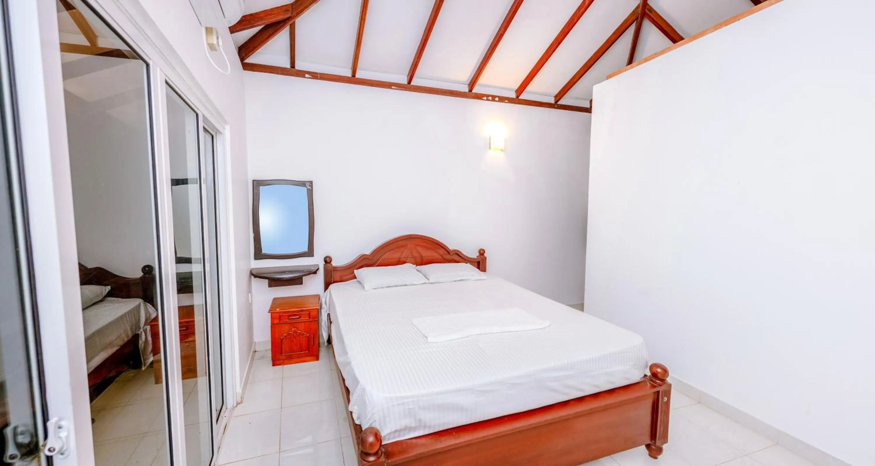 Bedroom, Bed in Savenndra Resorts