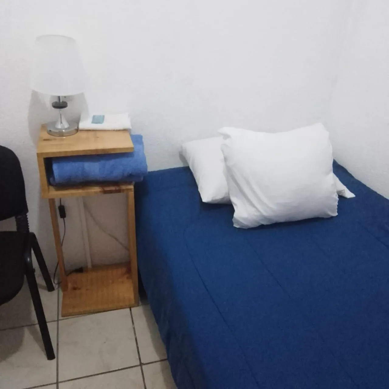 Bed in Hotel Bluehouse