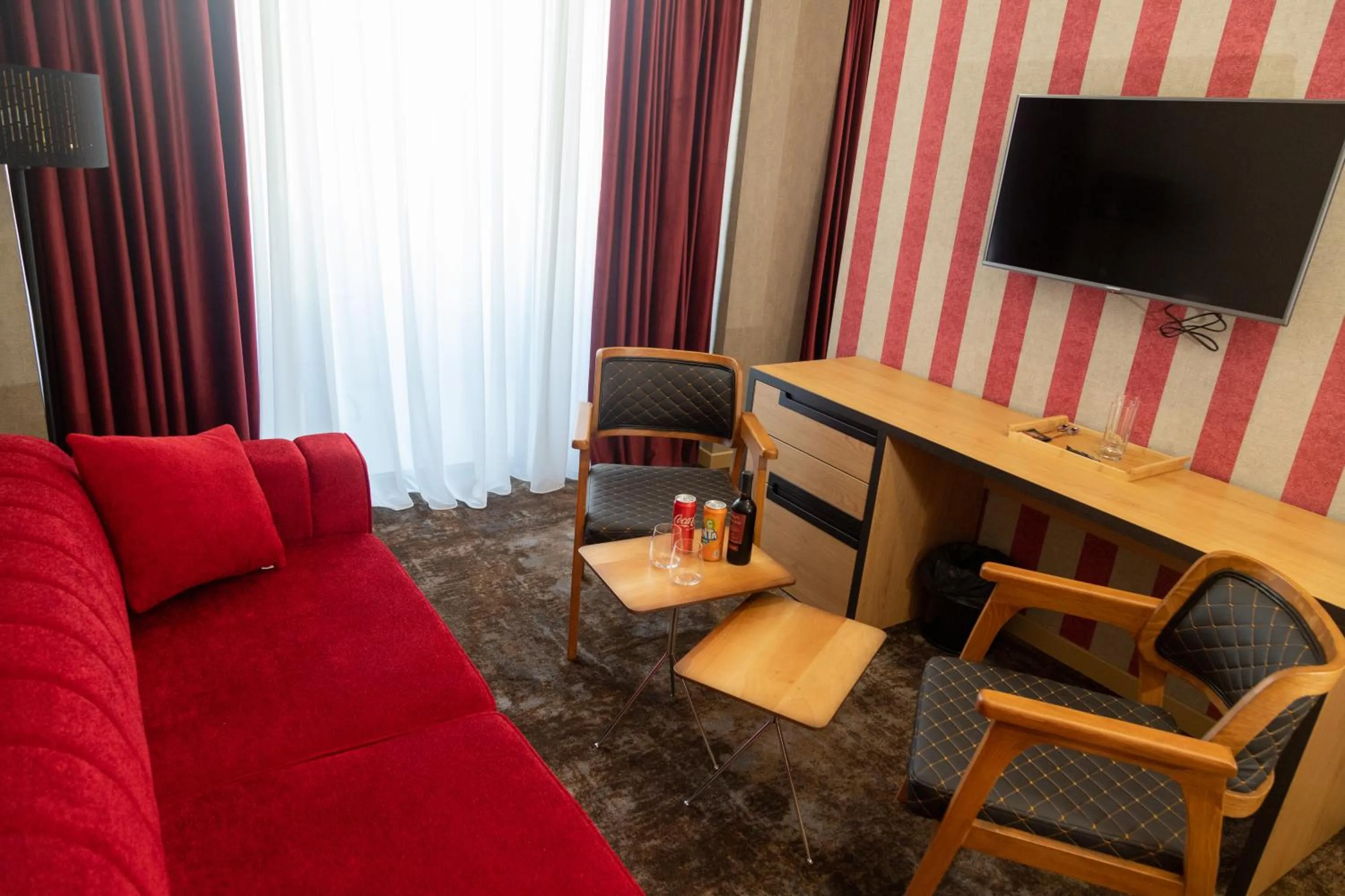 Communal lounge/ TV room in Hotel Solum Roof Top