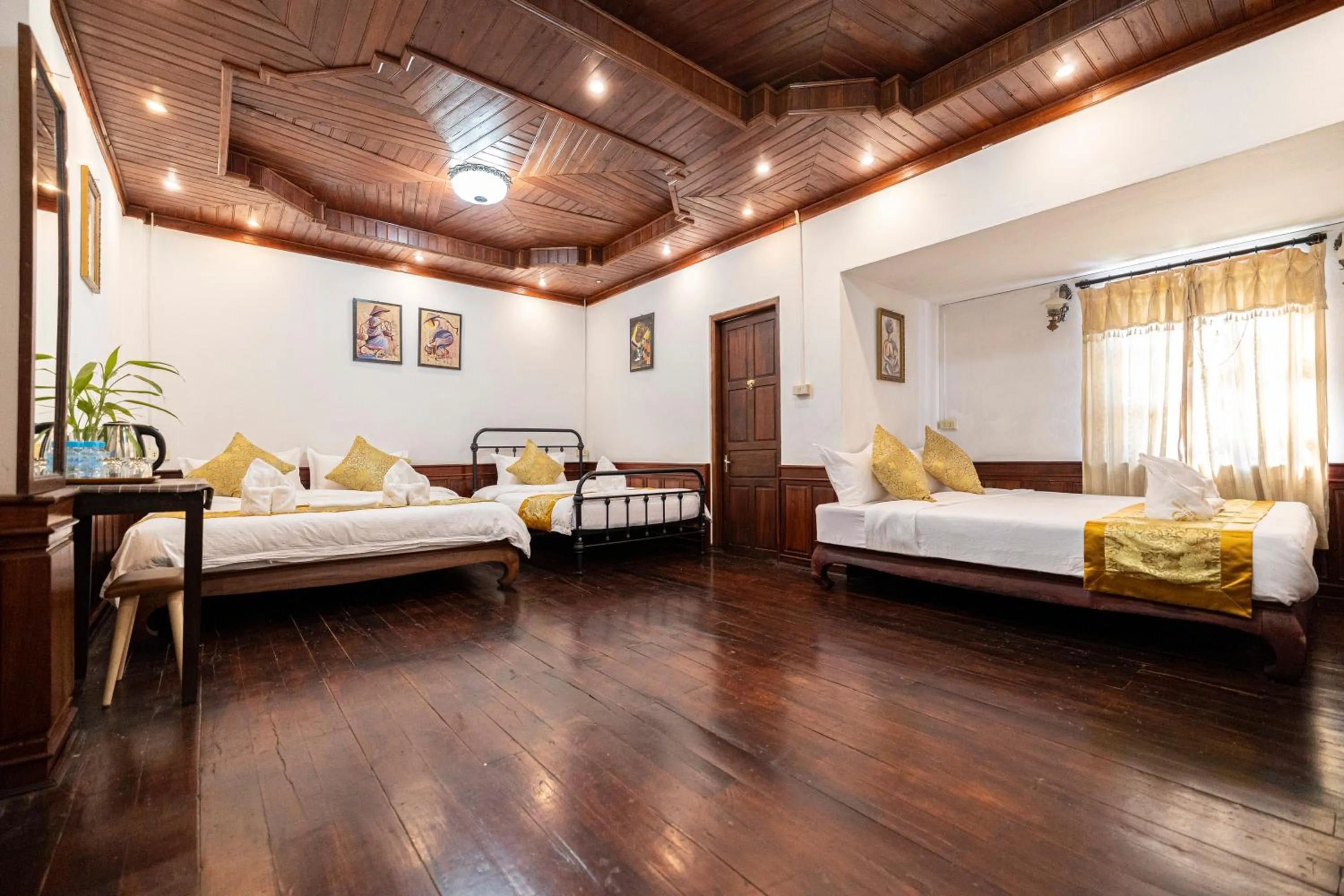 Bed in Mekong Chidlatda Villa