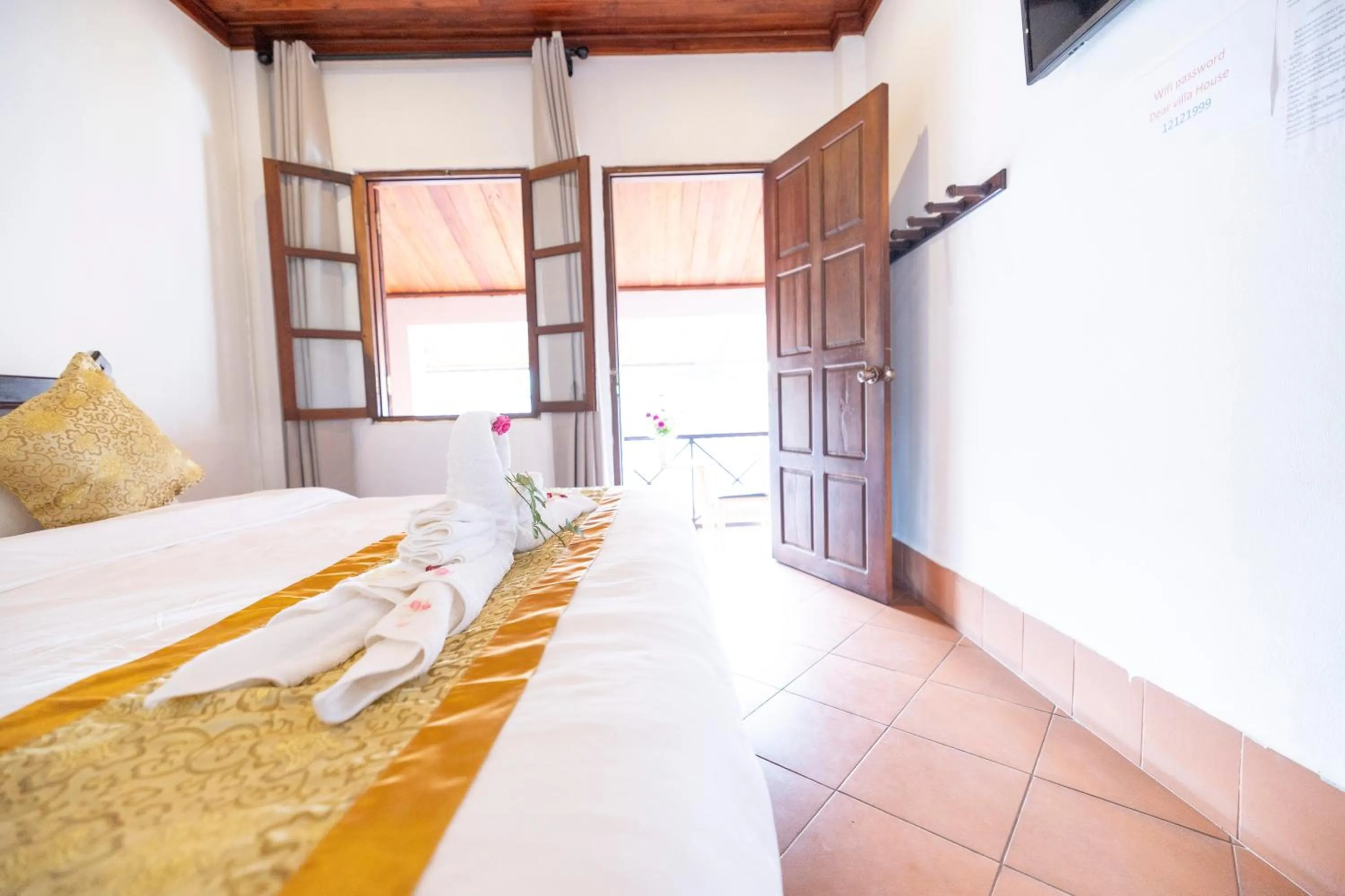 Bed in Mekong Chidlatda Villa