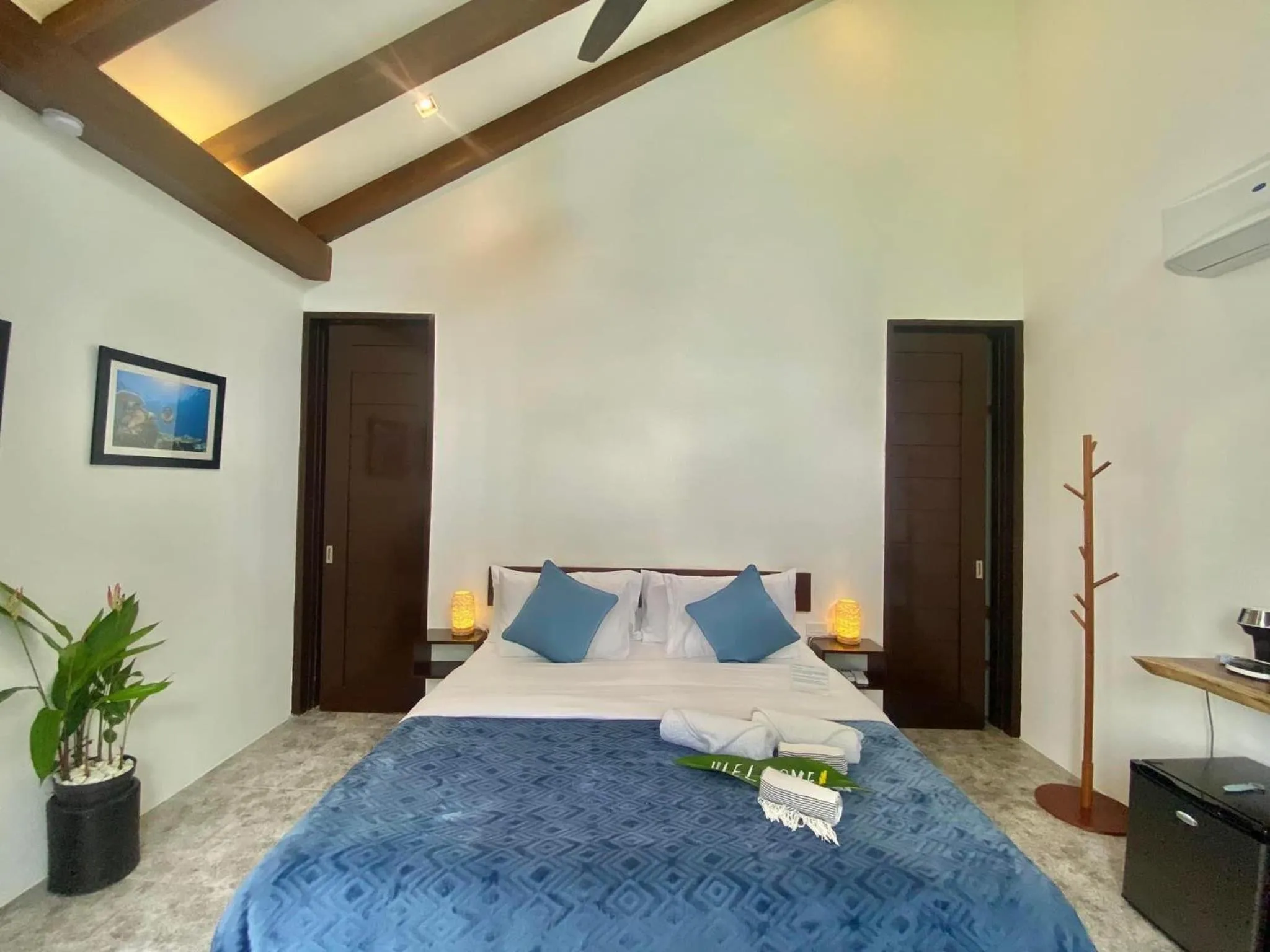 Bed in Amila Dive Beach Resort