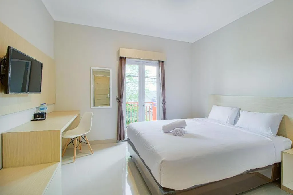 Bed in Wisma Minongga By SPAZIE