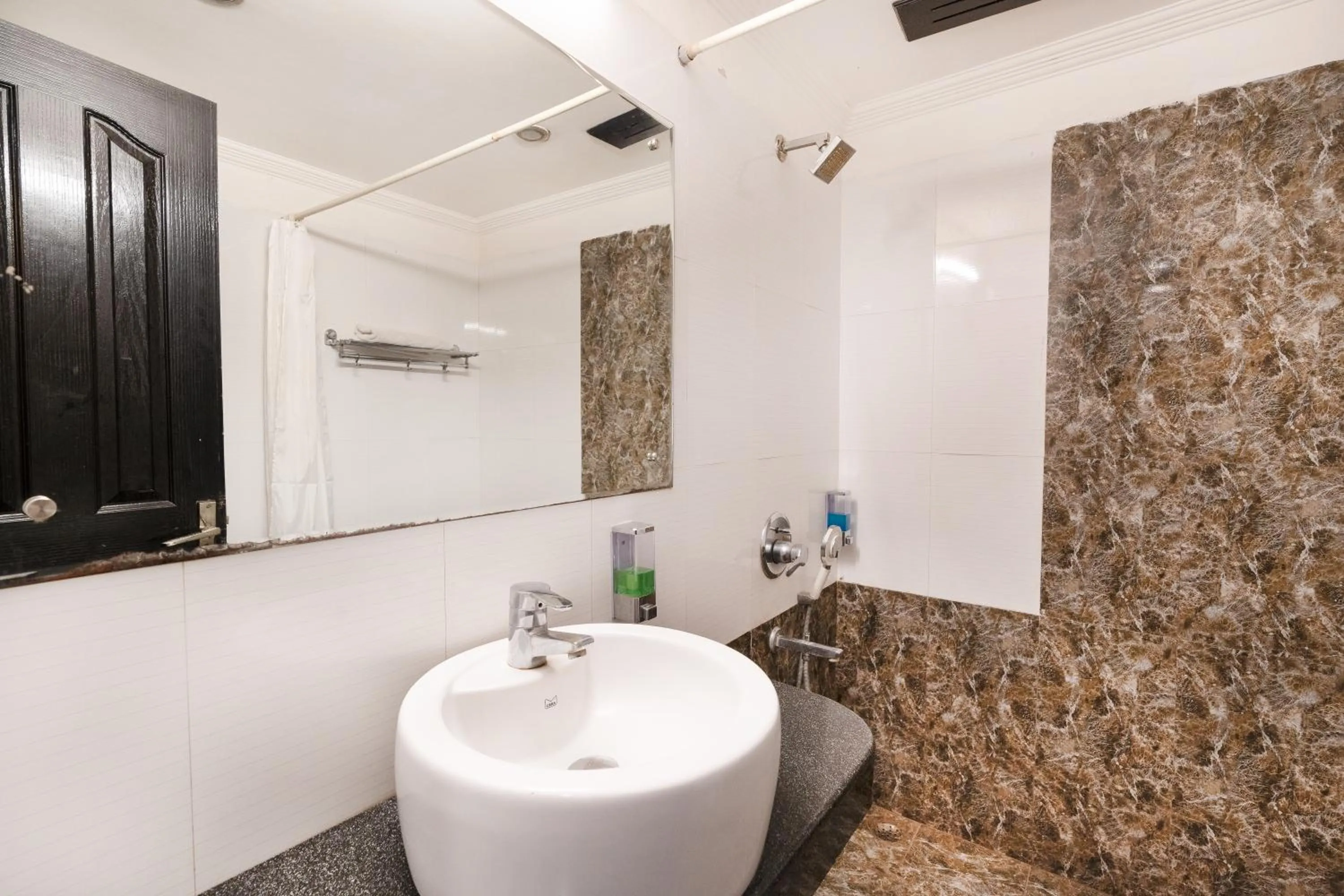 Shower in Skylark Hotel by Gabrian Hotels