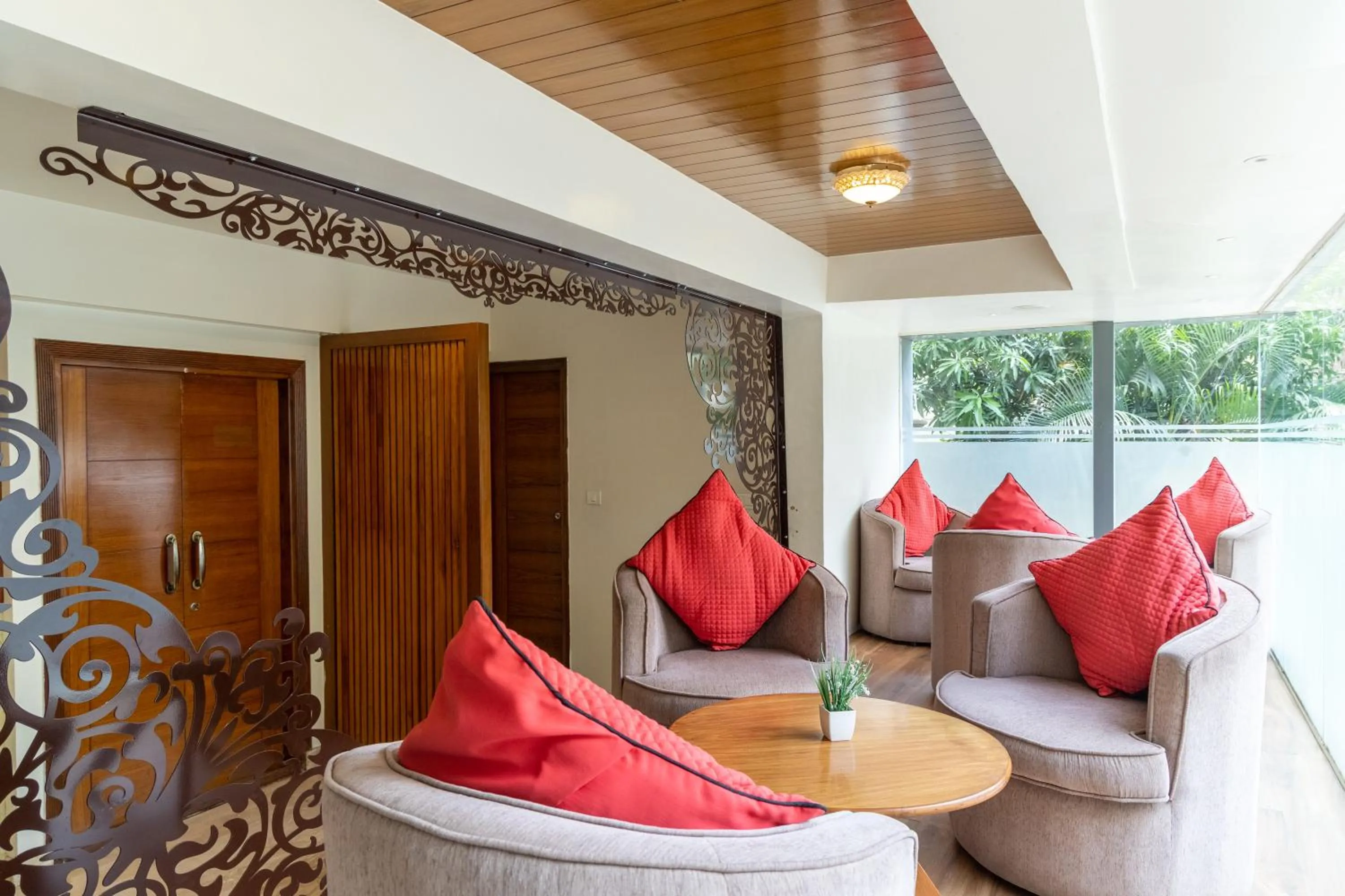 Living room in Tetrad Hotels - International Airport Road Hebbal