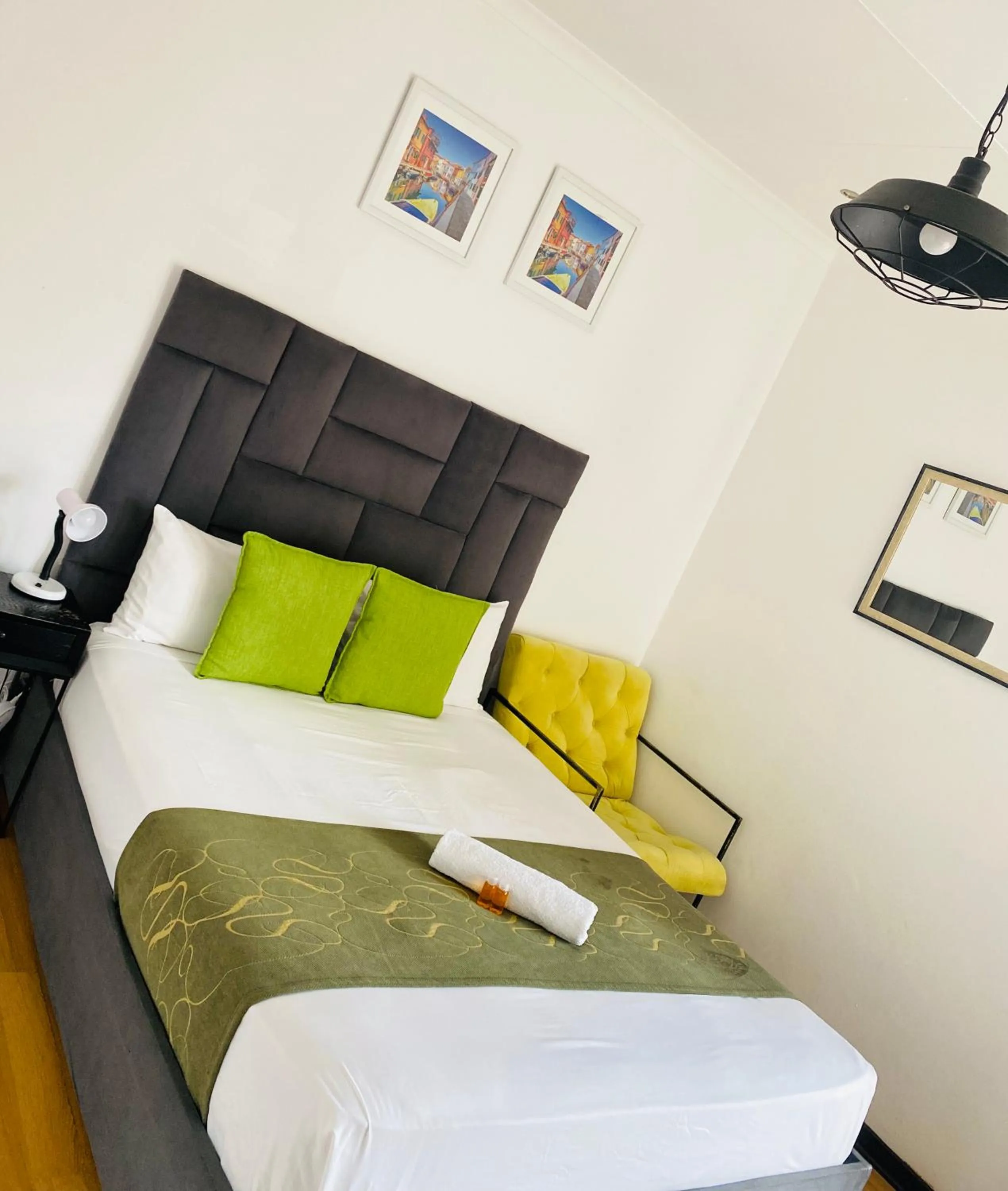 Bed in Airport Royal Guest House