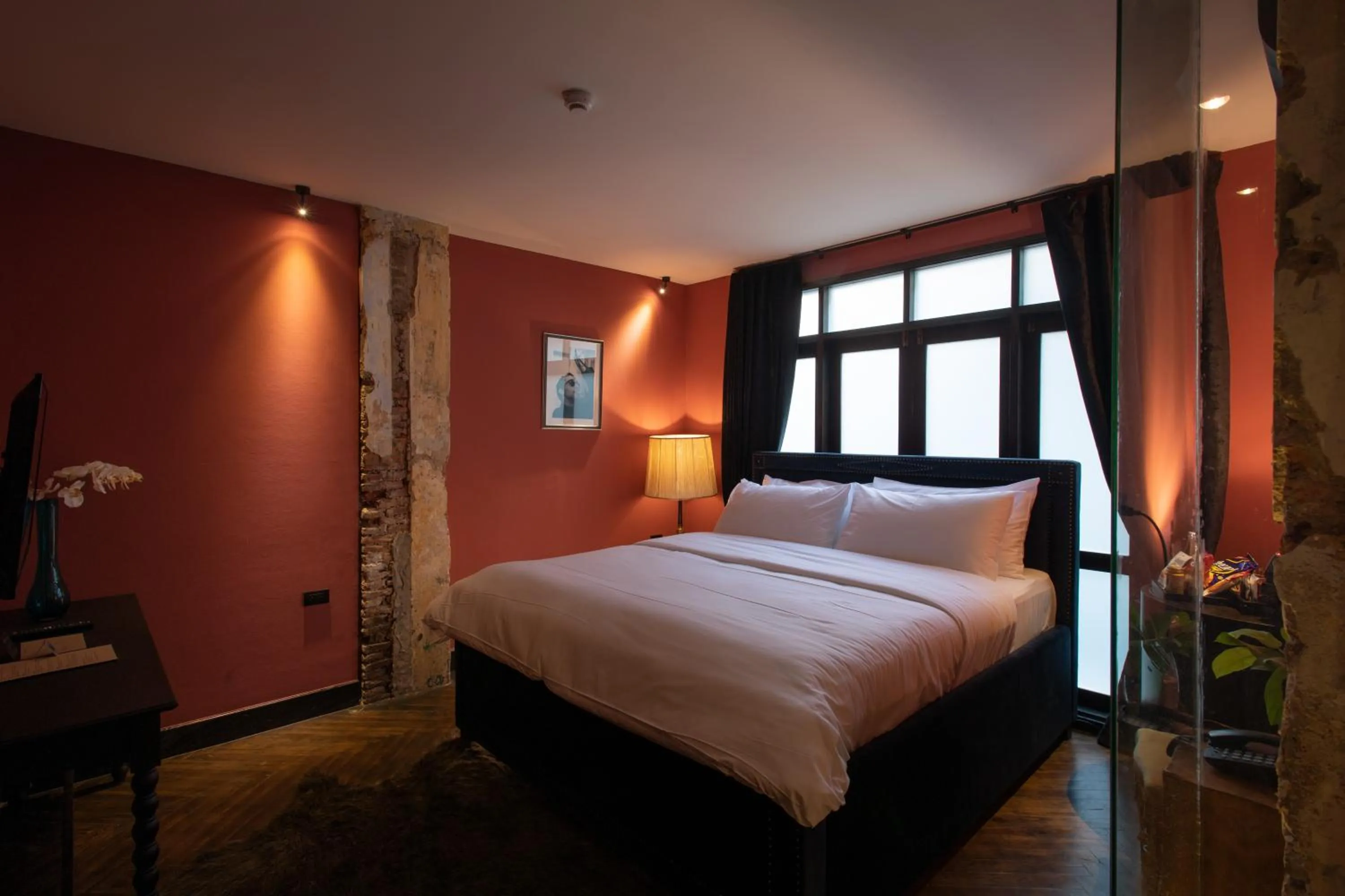 Bed in Baan Tuk Din Hotel