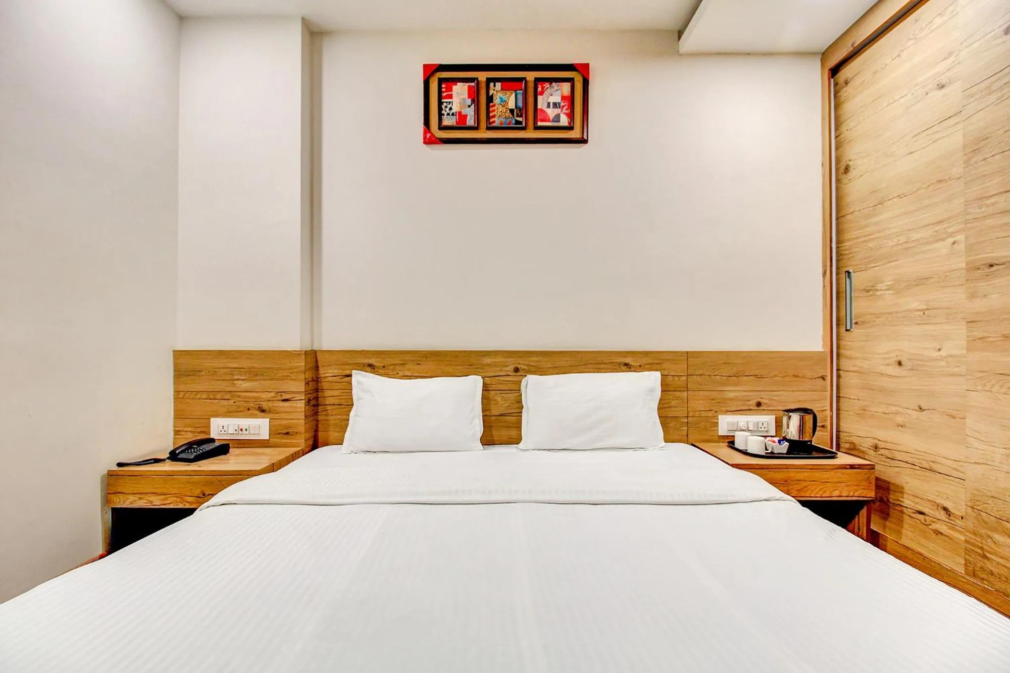 Bed in FabHotel Prime Manjeet