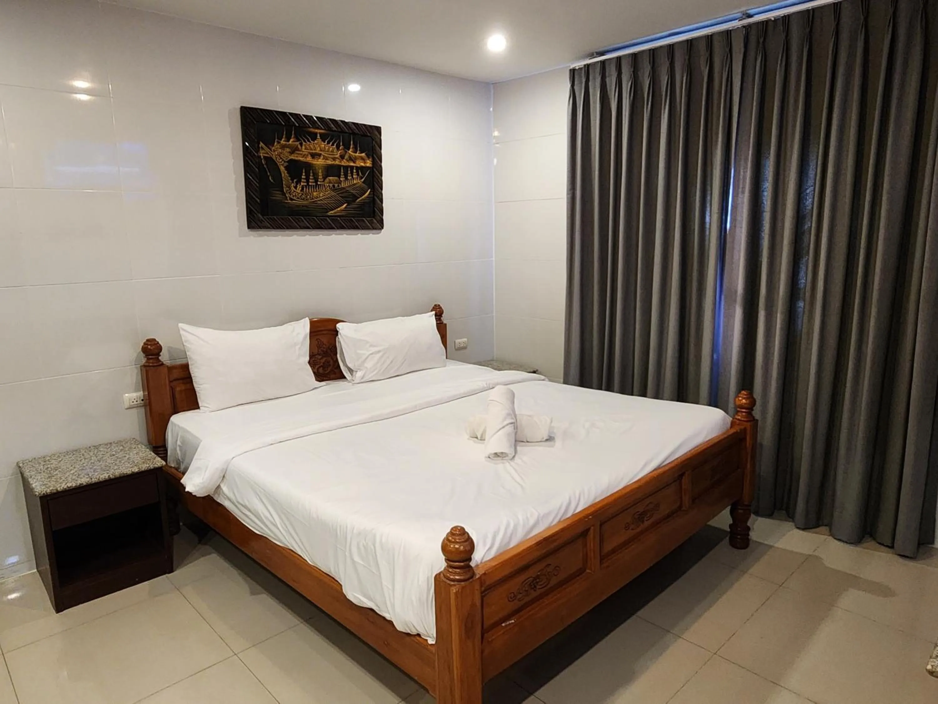 Bed in Patong Dynasty Royal Hotel