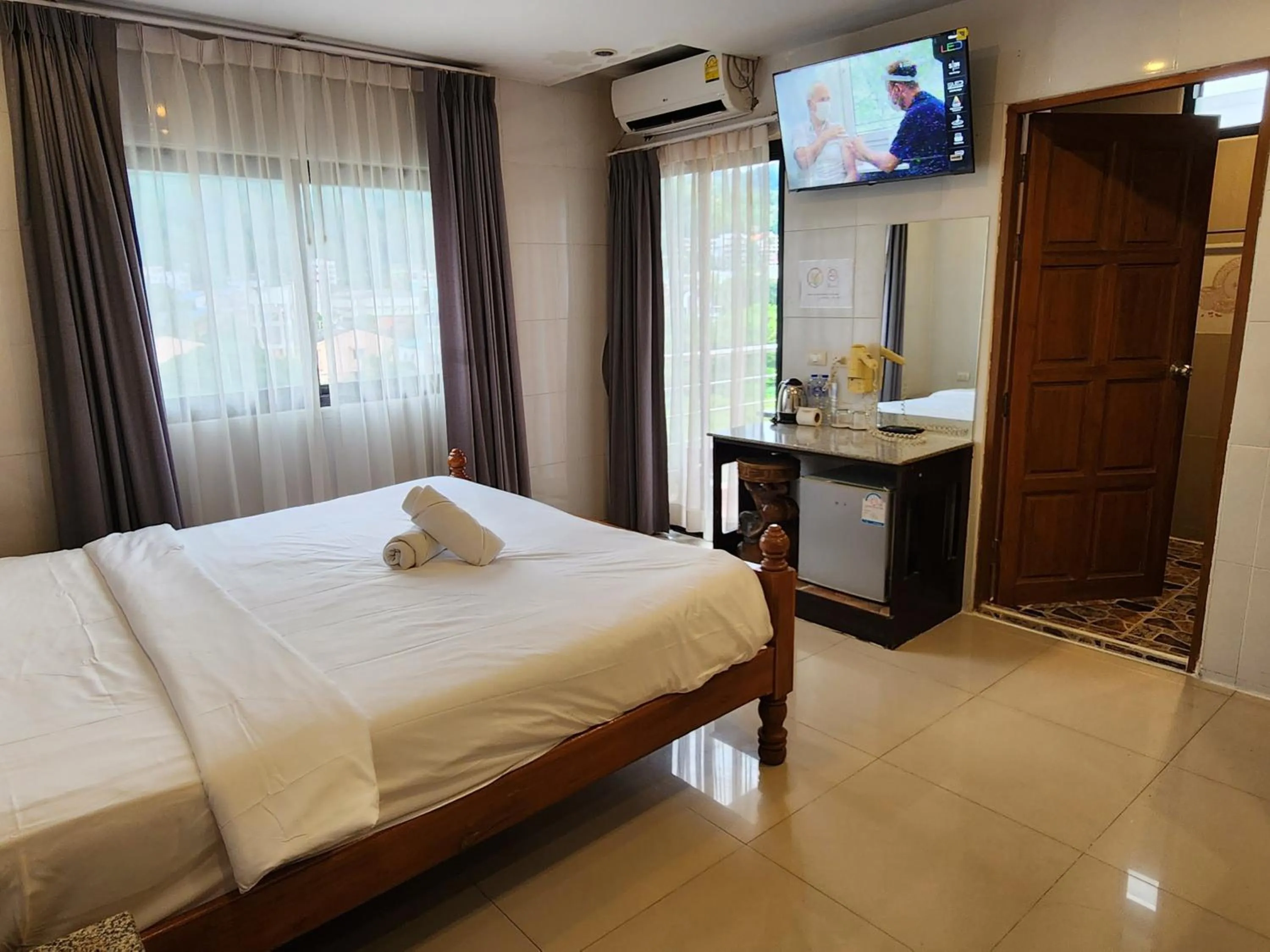 Bed in Patong Dynasty Royal Hotel