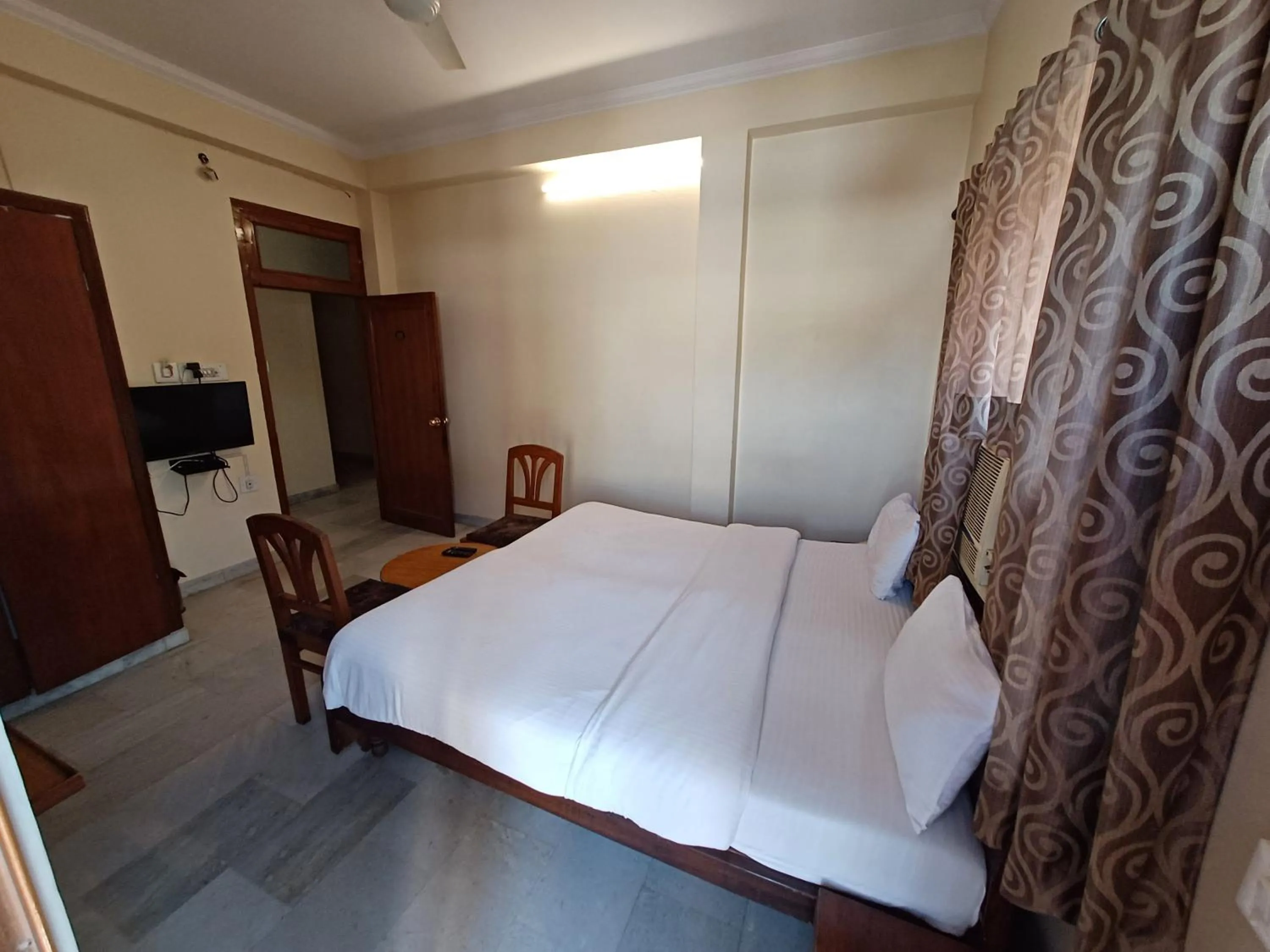 Photo of the whole room, Bed in Hotel Raghav Palace 1 km Jaipur Junction & Bus Stand Sindhi Camp