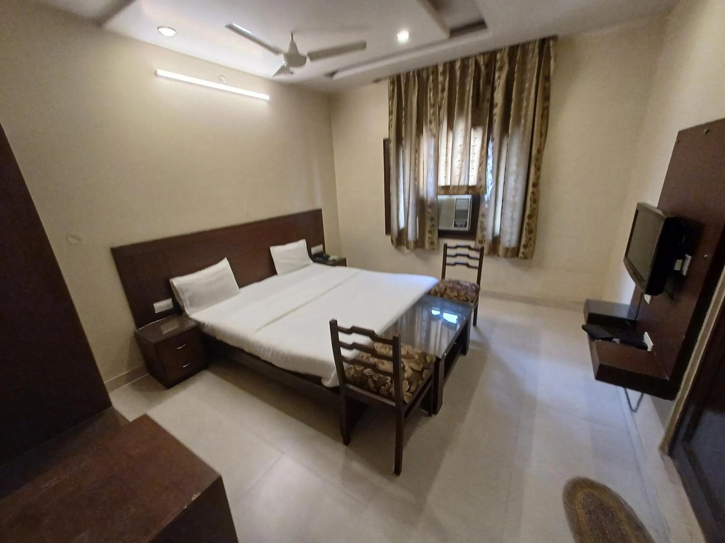 Photo of the whole room, Bed in Hotel Raghav Palace 1 km Jaipur Junction & Bus Stand Sindhi Camp