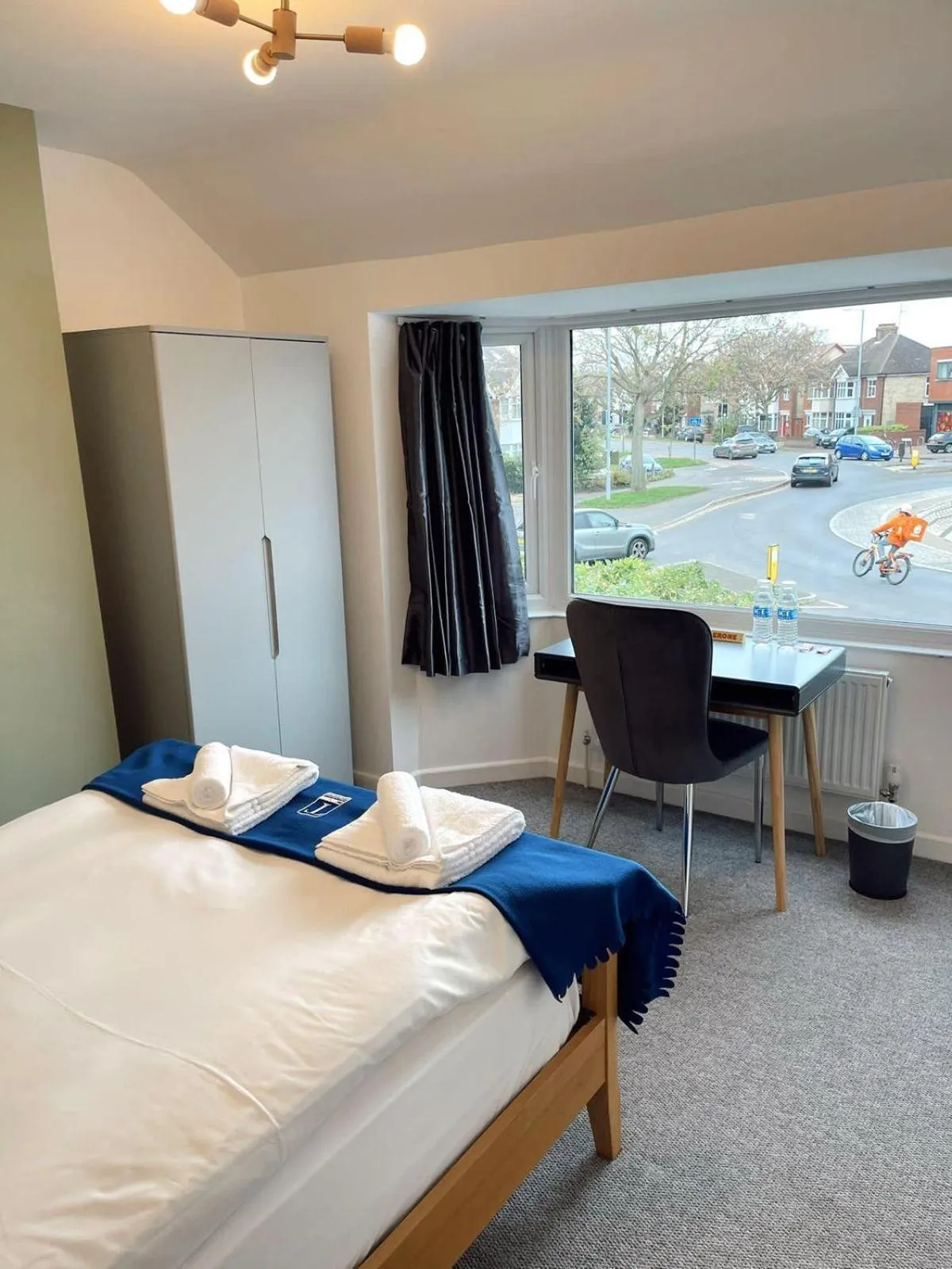 Bed in Cambridge Studios and Suites by Tas Accommodations